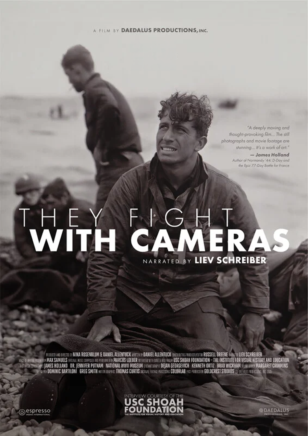 Black and white poster for the documentary 'They Fight with Cameras' narrated by Liev Schreiber, featuring a young man with curly hair and a pained expression sitting on a rocky beach, with others in the background.