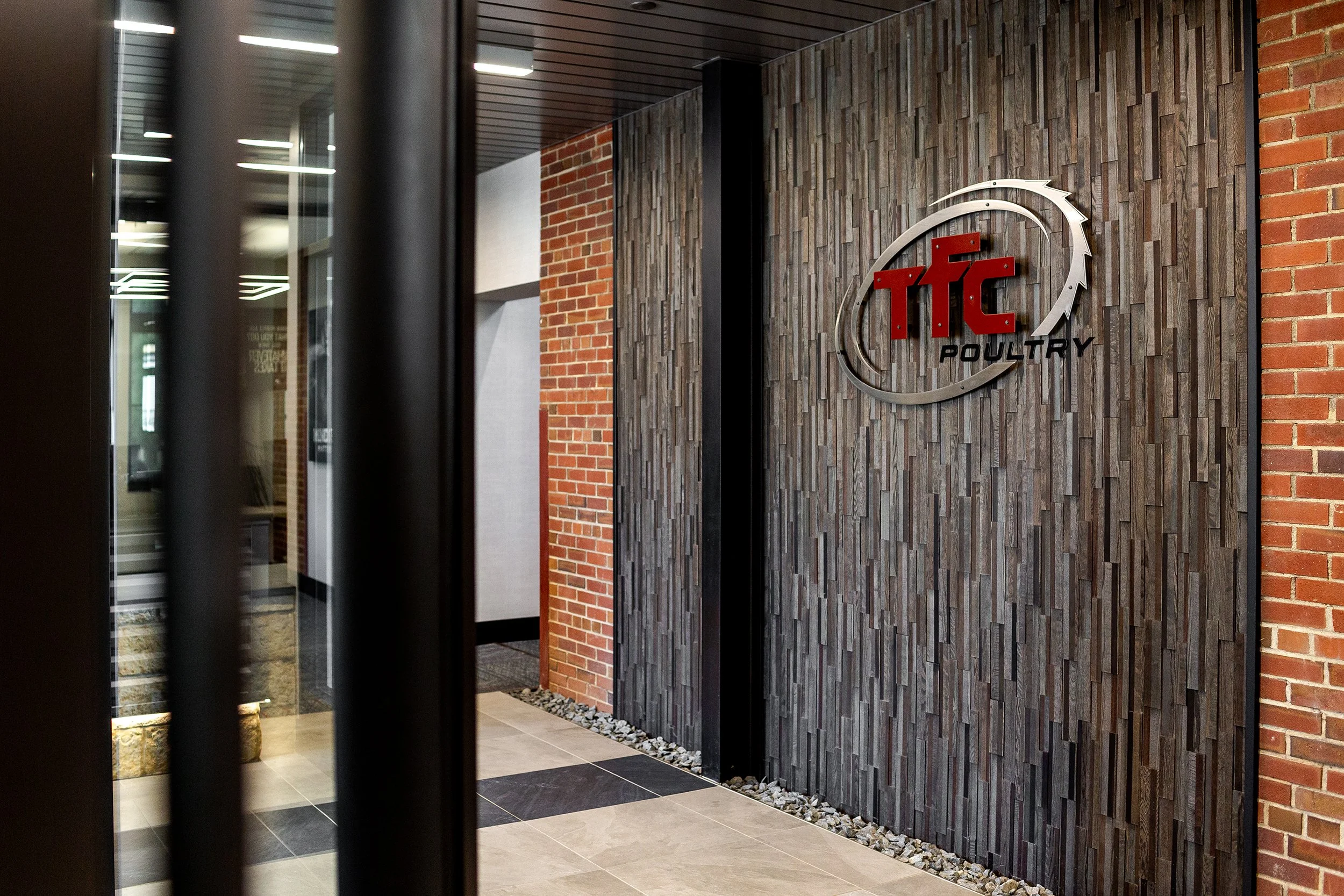 Photo of interior signage on a brick wall