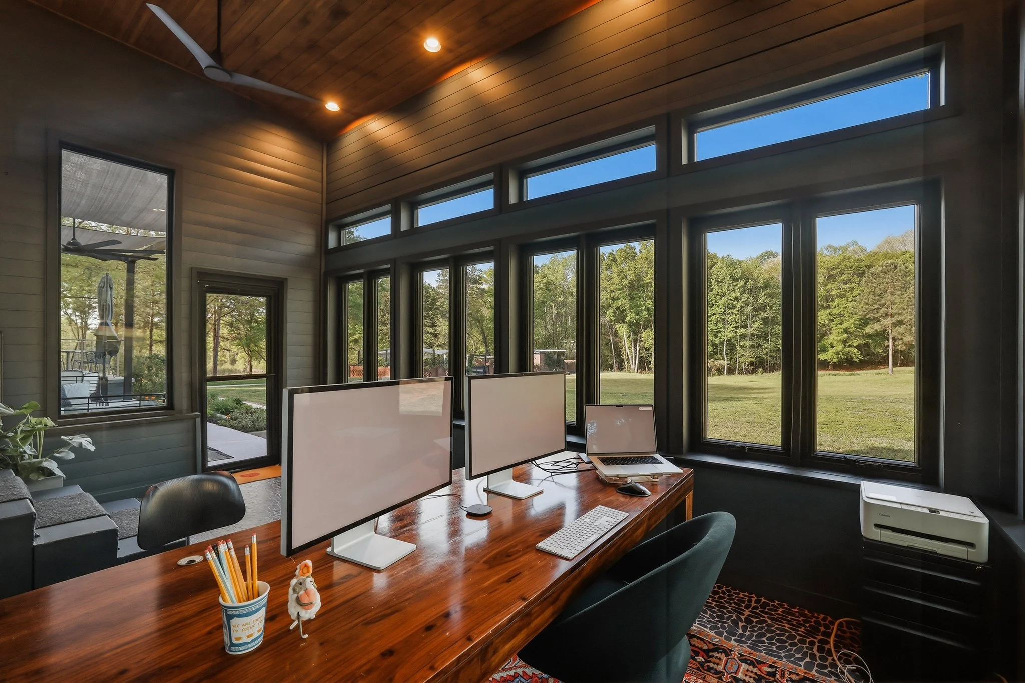 View room’s exit to the lower patio and peaceful view of the backyard