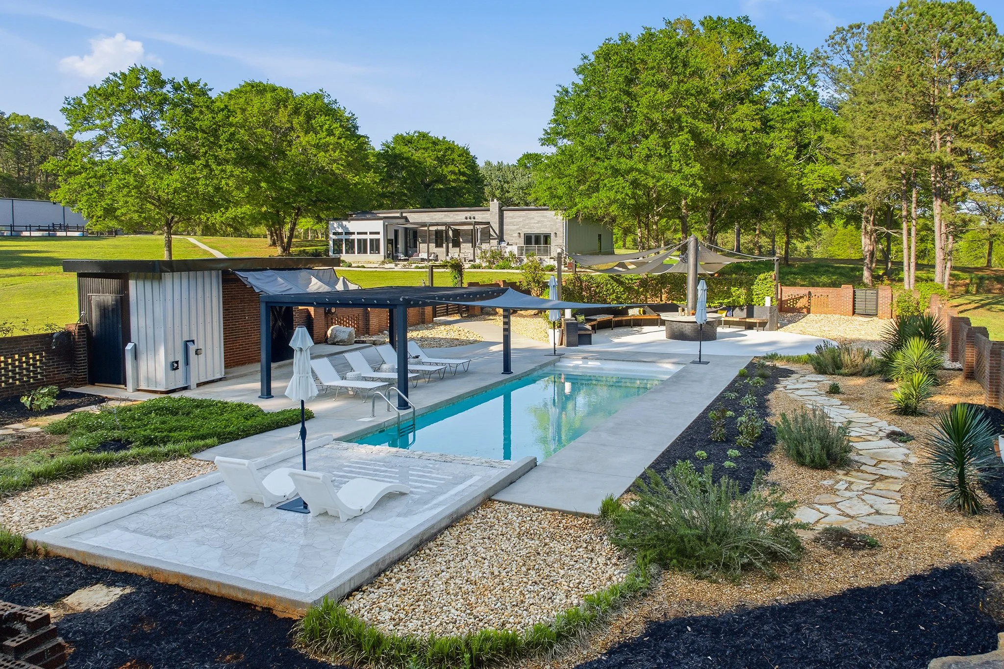 Take a peek at the bird's eye view of saltwater pool and its rock gardens
