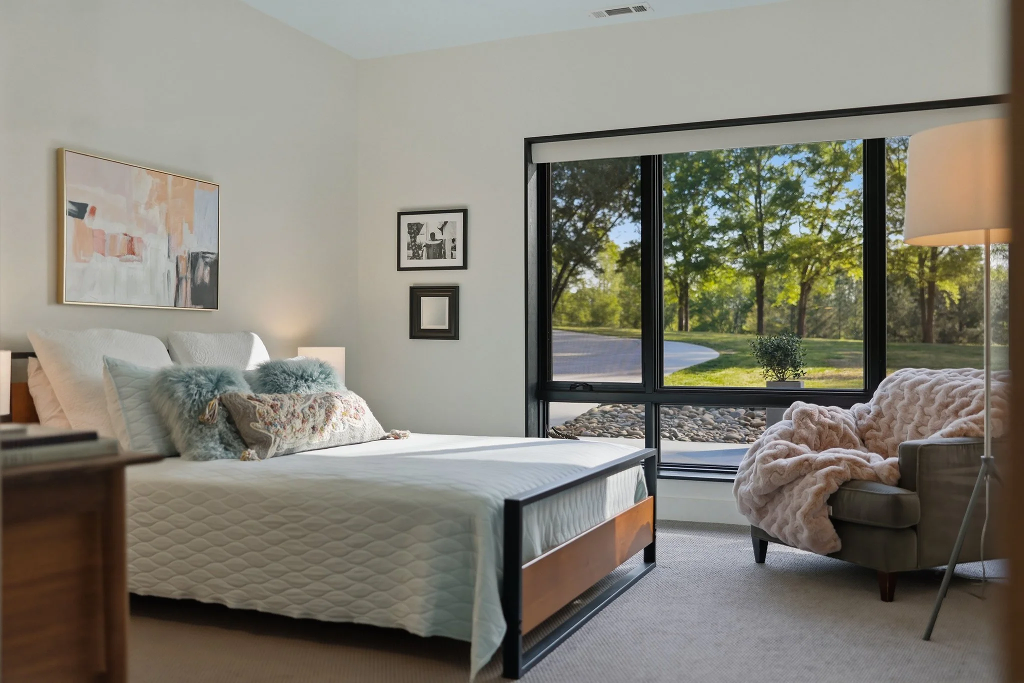 Admire the views from the guest bedroom with Sierra Pacific casement and picture windows