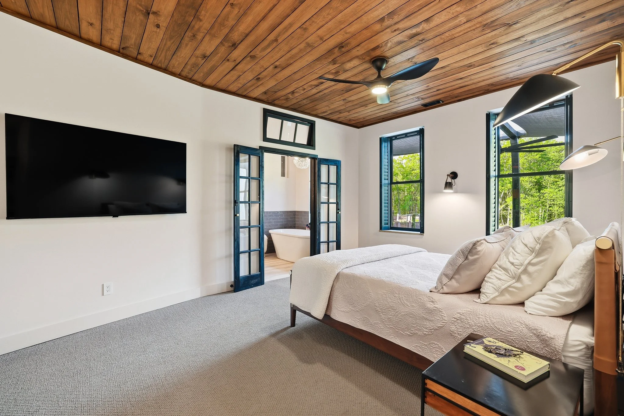 Primary bedroom opens directly into the  spa-like ensuite 