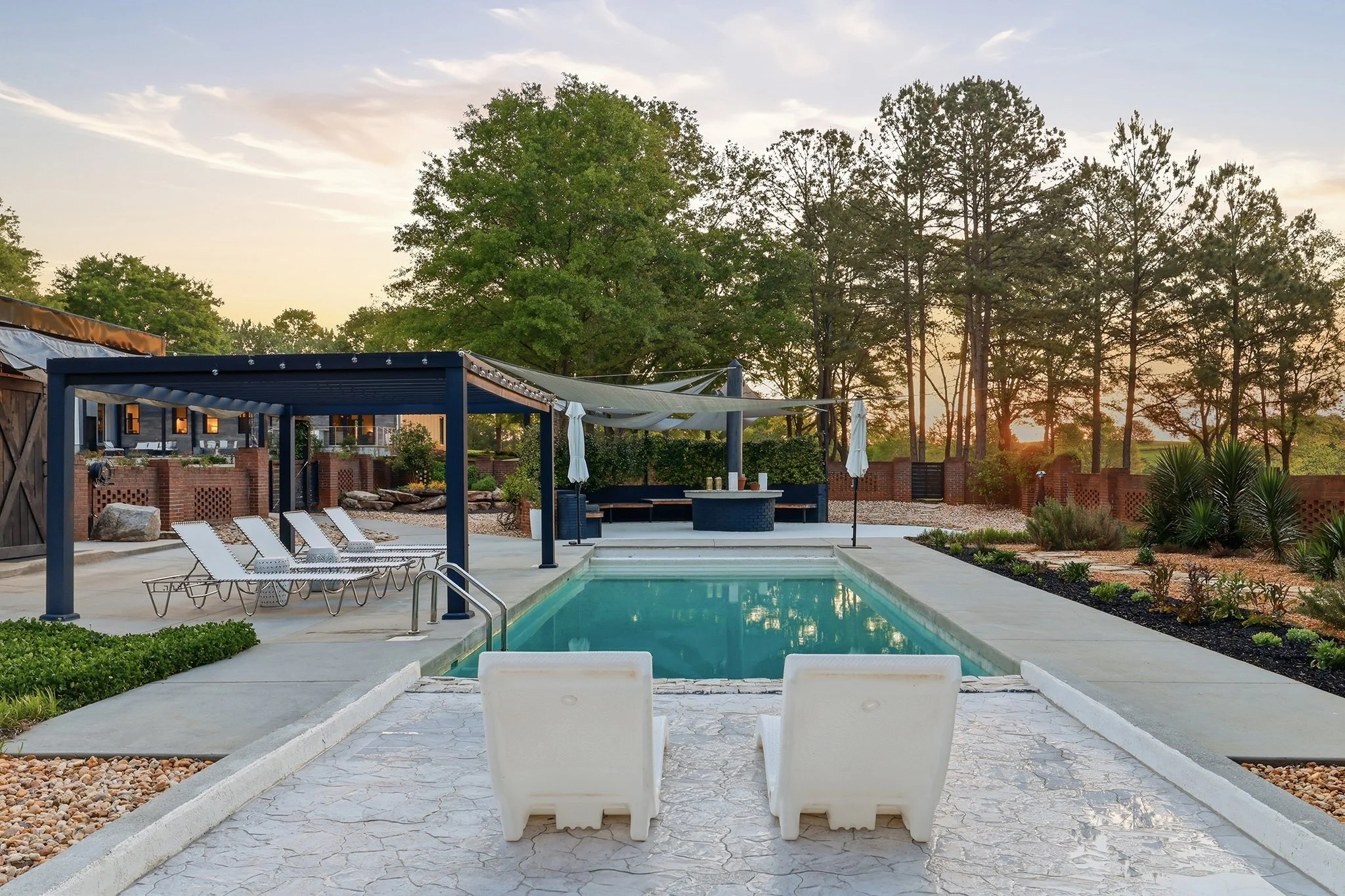Start your day right: enjoy the golden light of sunrise poolside before heading to work