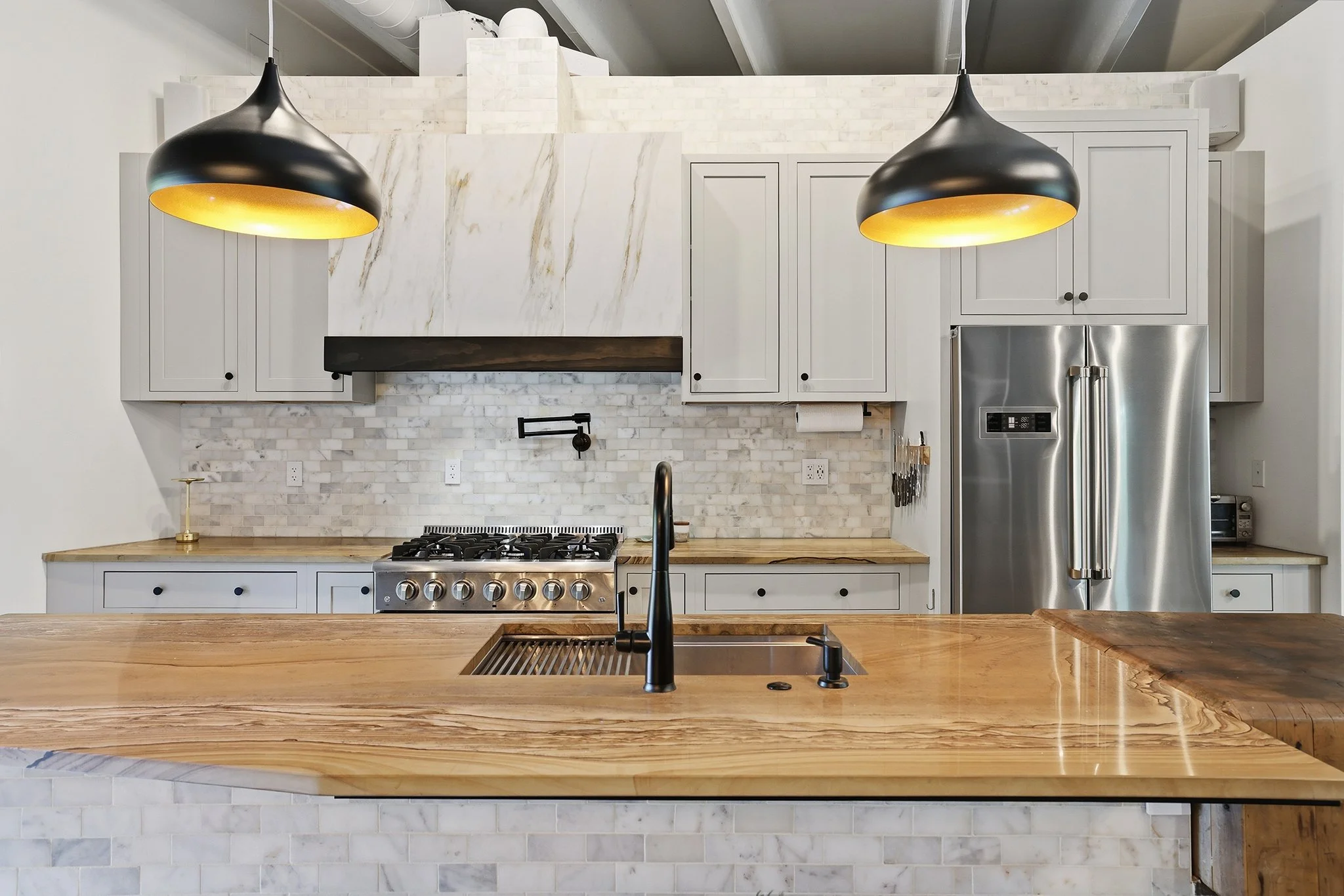 Deep sink and Delta touch-sensitive faucet make clean-up easy