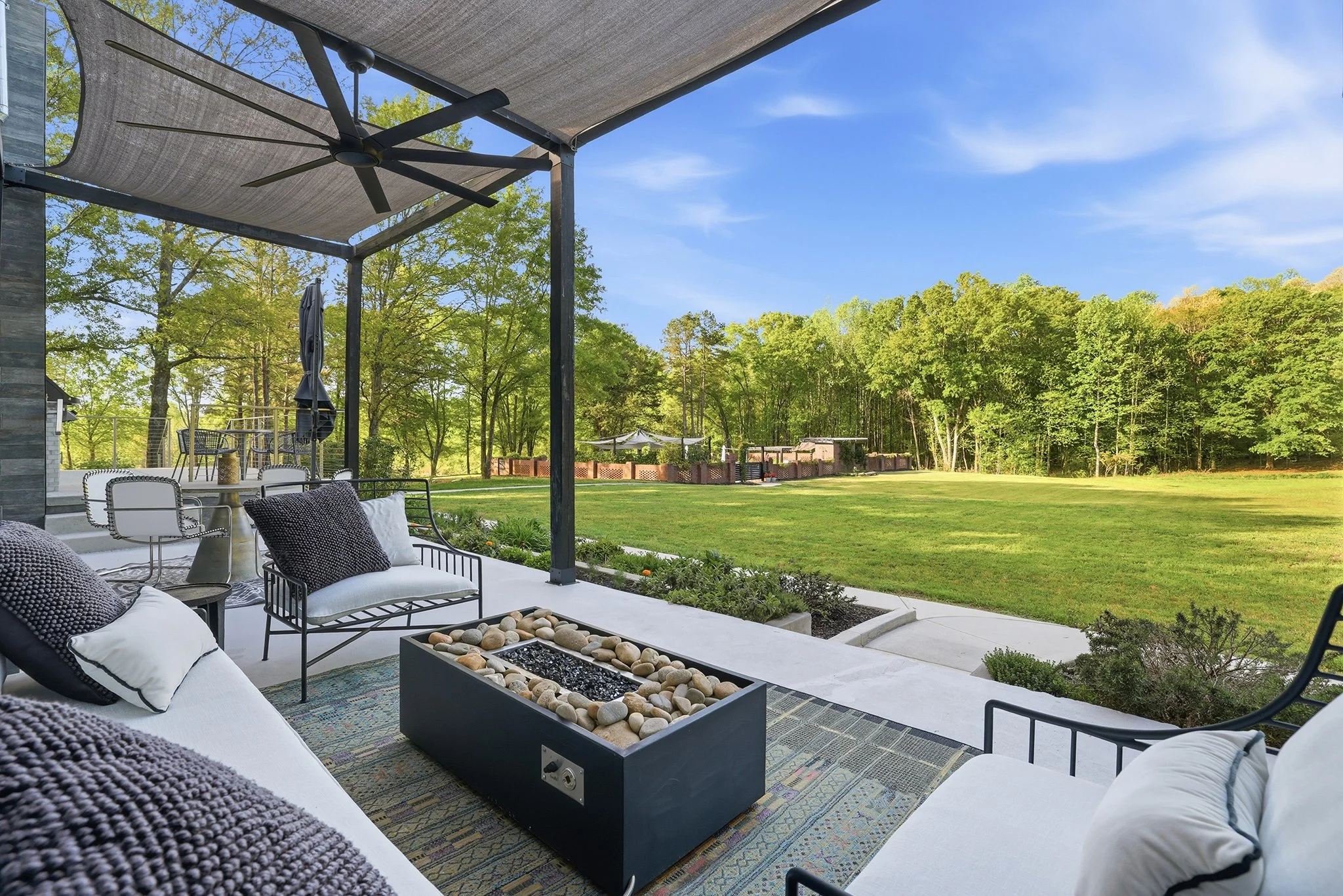 View of the pool from the lower deck creates multiple, visually connected entertaining areas