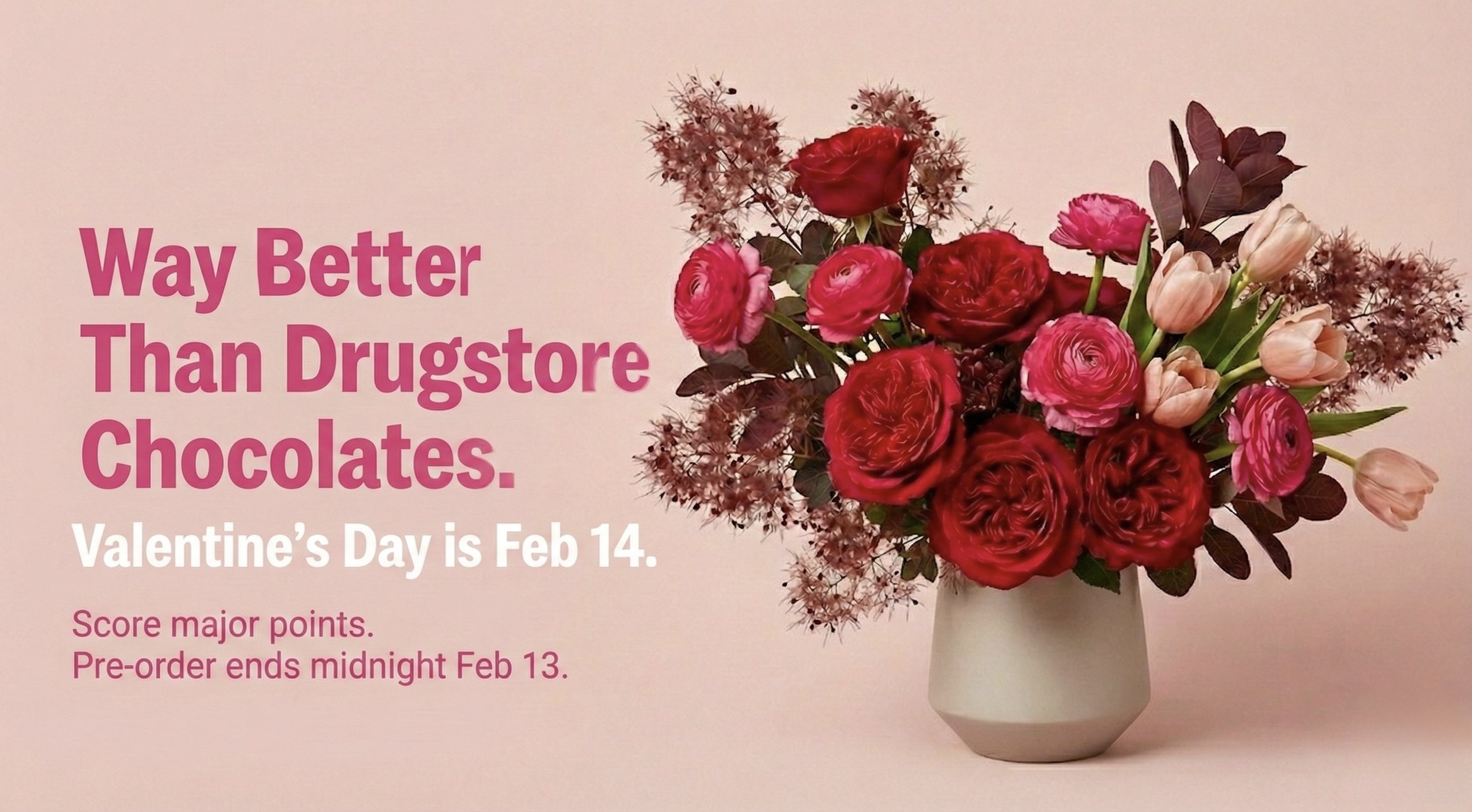 Fun pink Valentine's Day hero banner for Blumen Florals Vancouver. Modern floral arrangement with red garden roses, ranunculus, and tulips. Bold text reads: "Way Better Than Drugstore Chocolates. Valentine's Day is Feb 14. Score major points. Pre-ord