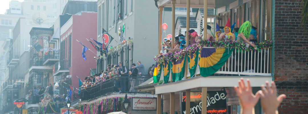 people celebrating on balconies