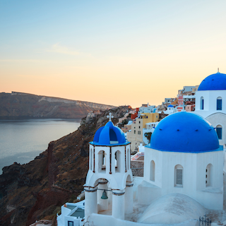 blue roof white houses on coast