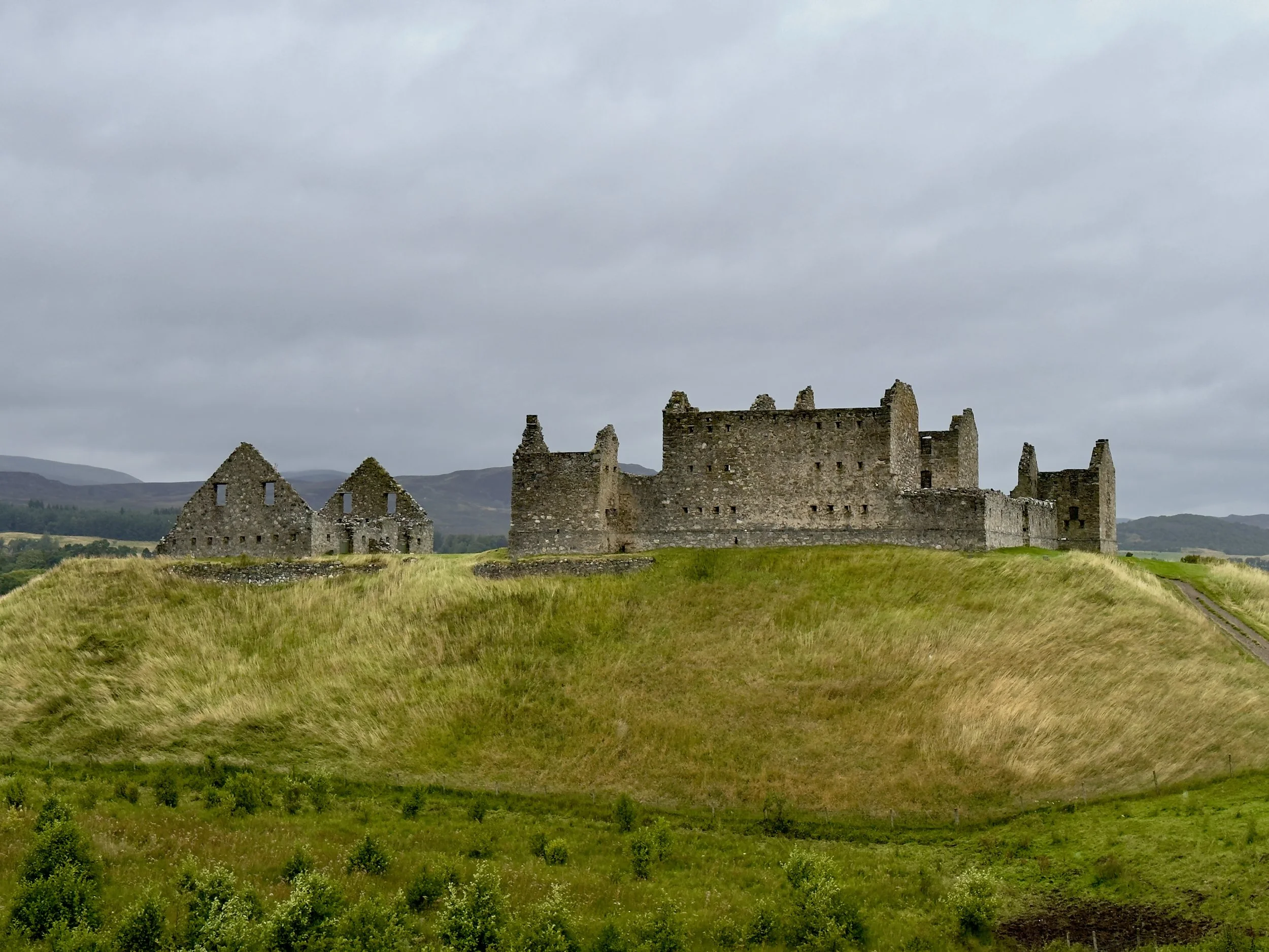 ruins on green hillside