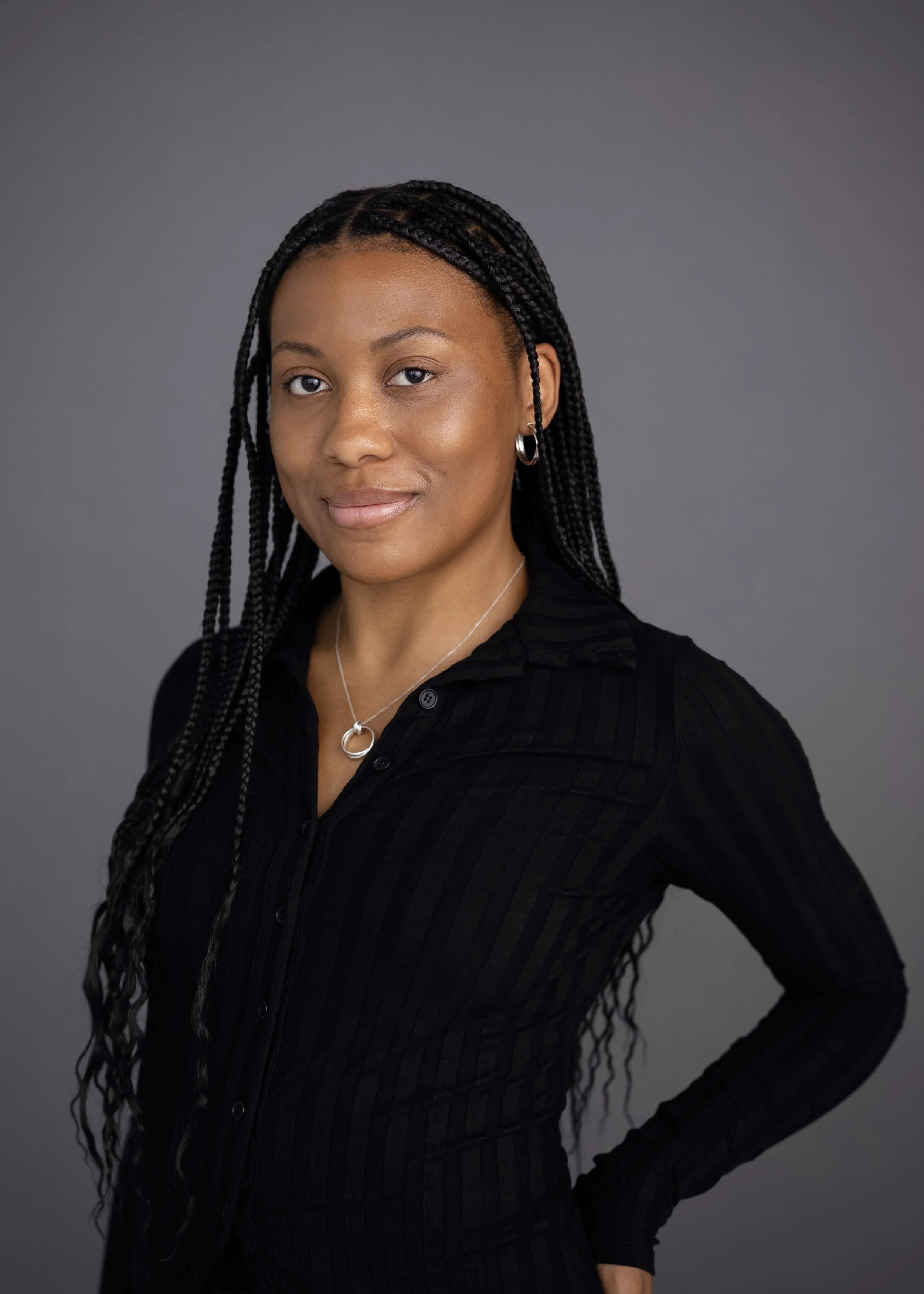 Malaika_Shuck_Headshot_Grace_Coudal_Studio-1 2.jpg