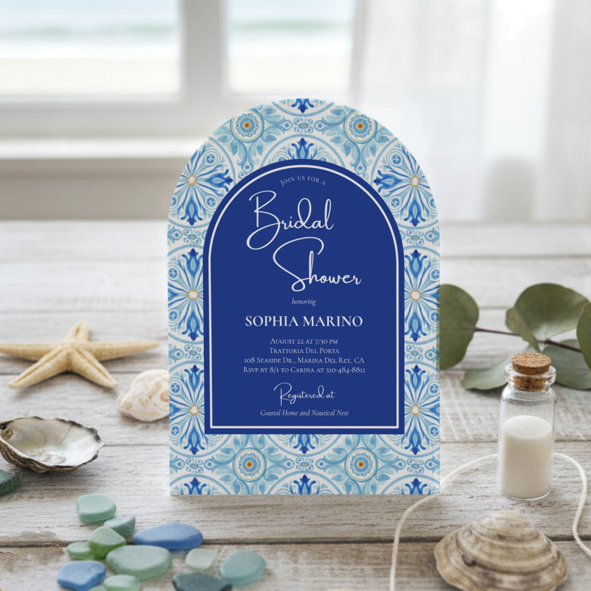 “Something Blue” bridal shower invitation inspired by the romance of the Amalfi Coast. The design features a deep cobalt blue arch framed by a Mediterranean tile border, accented with white lettering and handwriting-style script for a modern, breezy 