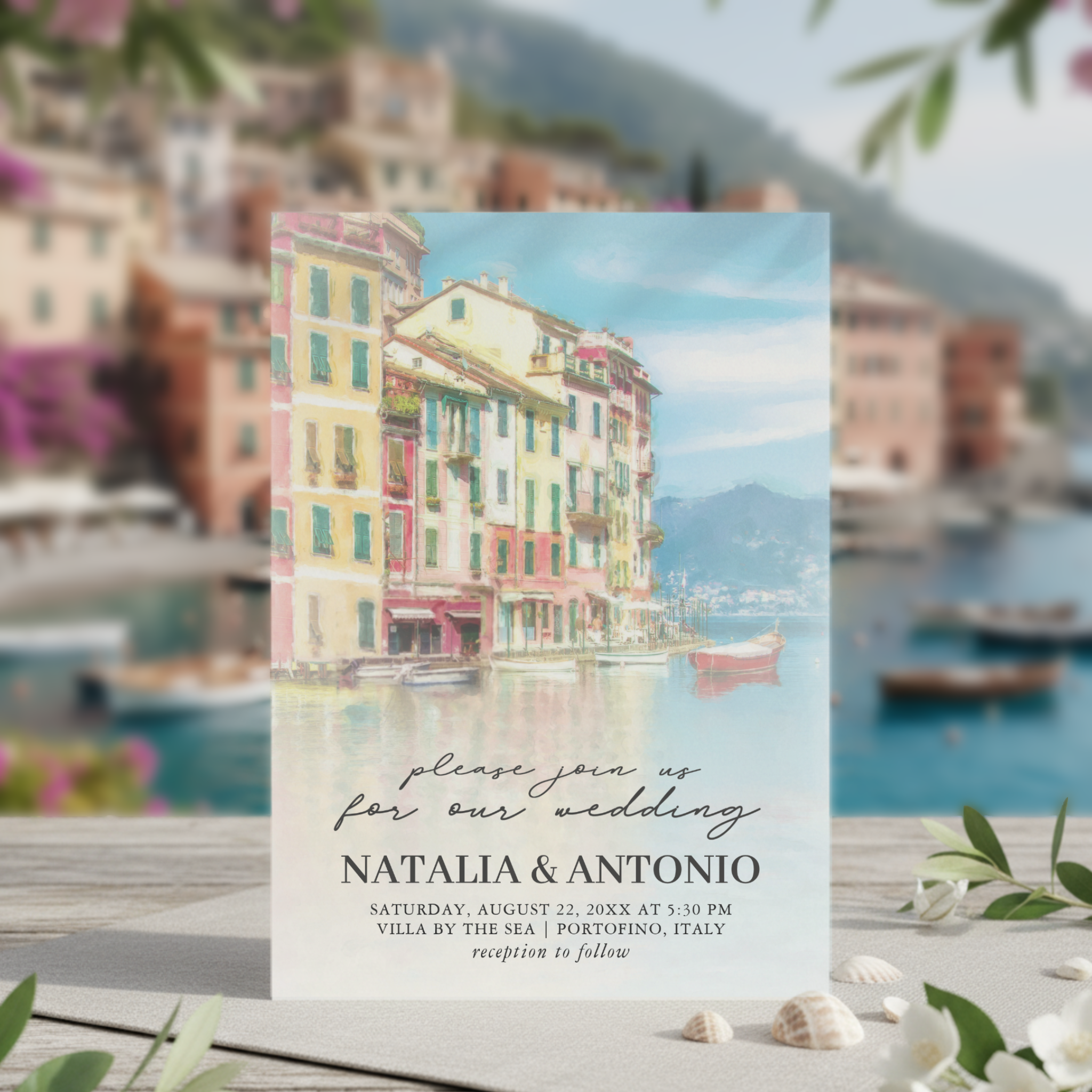 Bring the charm of Italy’s colorful harbor towns to your wedding with this hand-painted Portofino invitation. Featuring a romantic watercolor scene of waterfront architecture, boats and sea, it captures the picturesque elegance of the Italian Riviera