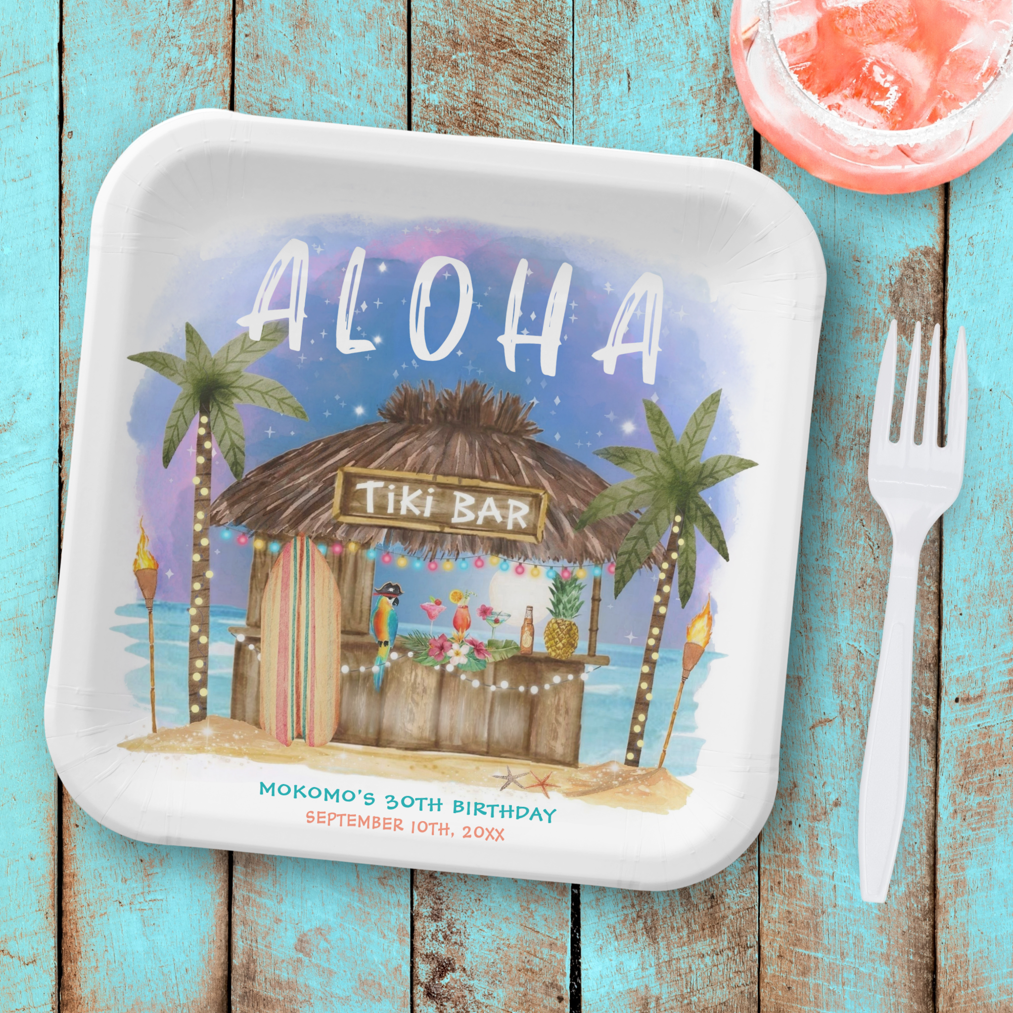 Tiki party birthday paper plates featuring a tiki bar on a tropical beach with ocean waves, palm trees, surfboard, cocktails and moonlight