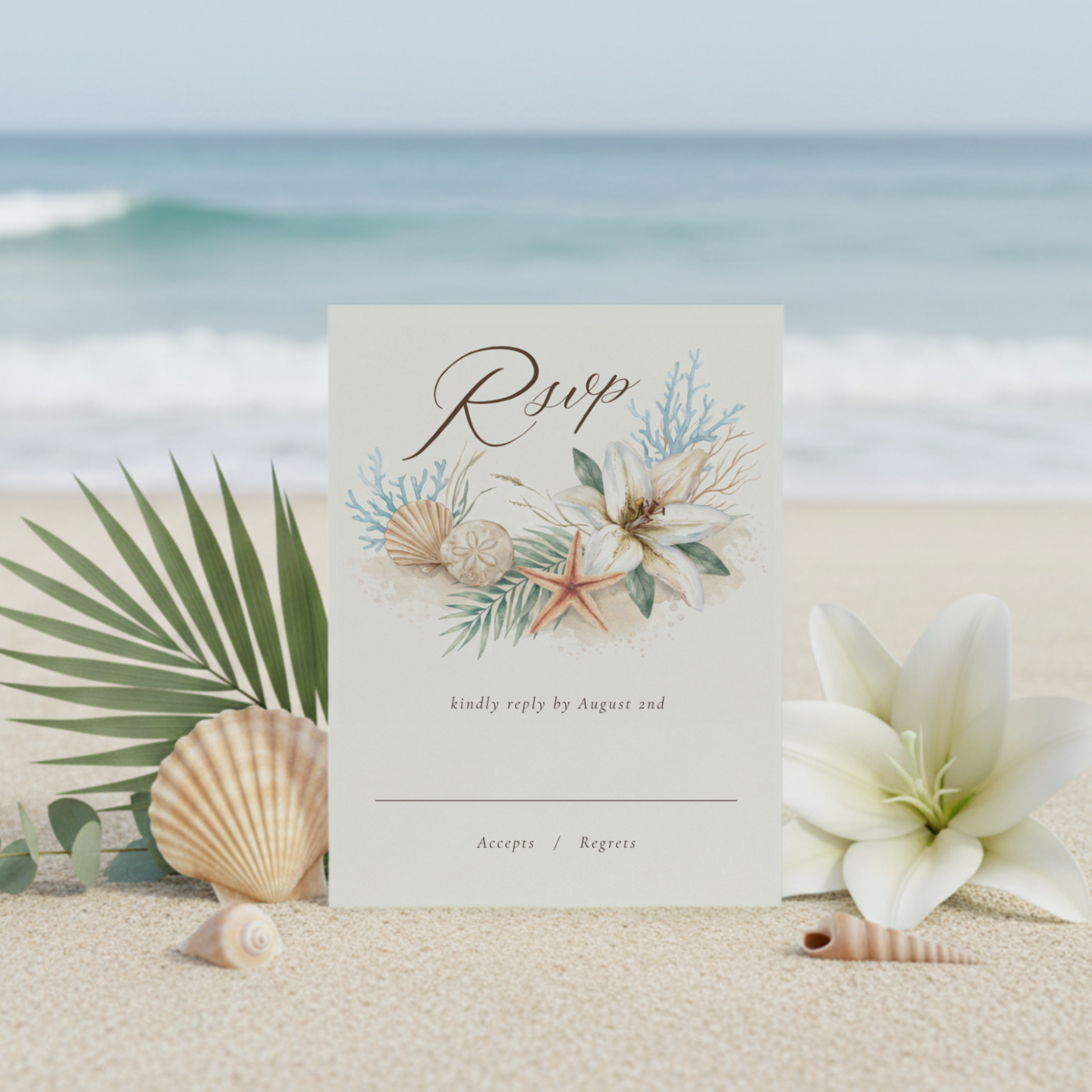 Tropical Boho Beach Wedding RSVP Card featuring watercolor white Oriental lilies, seashells, coral accents, palm fronds, and eucalyptus leaves. Designed to coordinate beautifully with the matching wedding suite, this elegant response card helps guest