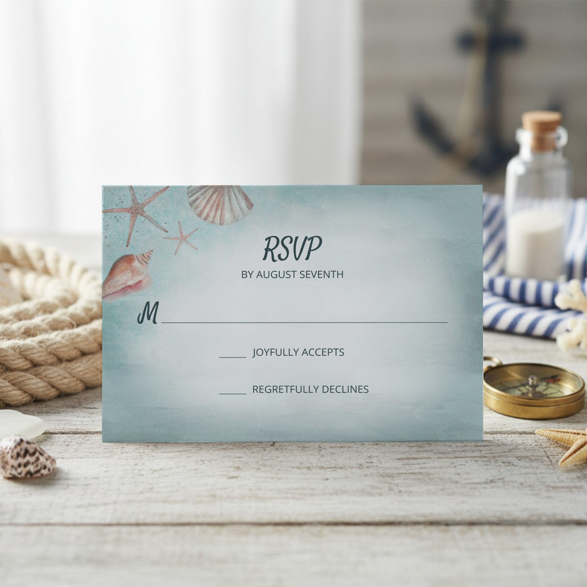 Coastal theme wedding RSVP features a weathered ocean blue watercolor brushstroke background with seashells and coral. Perfect for beach, nautical, tropical, summer and "Under the Sea" wedding themes. 