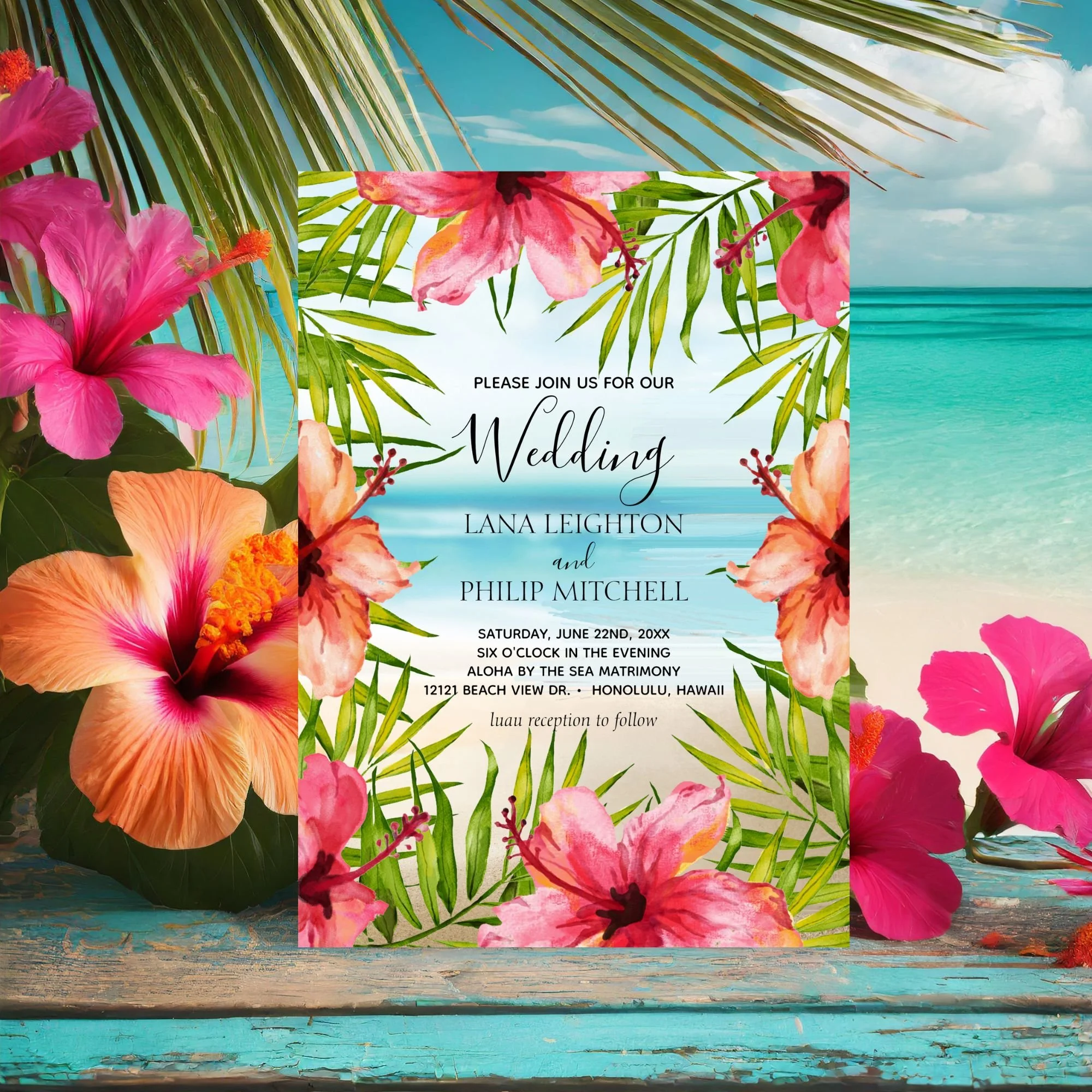 Island themed wedding invitation featuring a watercolor beach, tropical hibiscus flowers and palm leaves