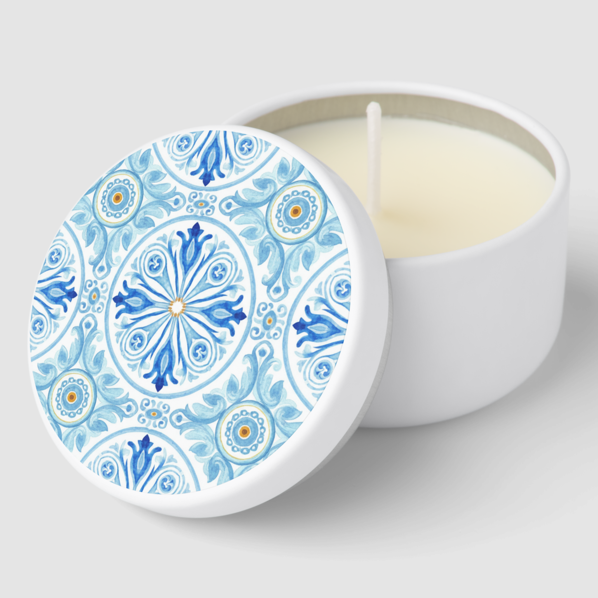 Wedding favor candle topped with a Mediterranean tile pattern, adding a charming Amalfi Coast touch to your celebration.
