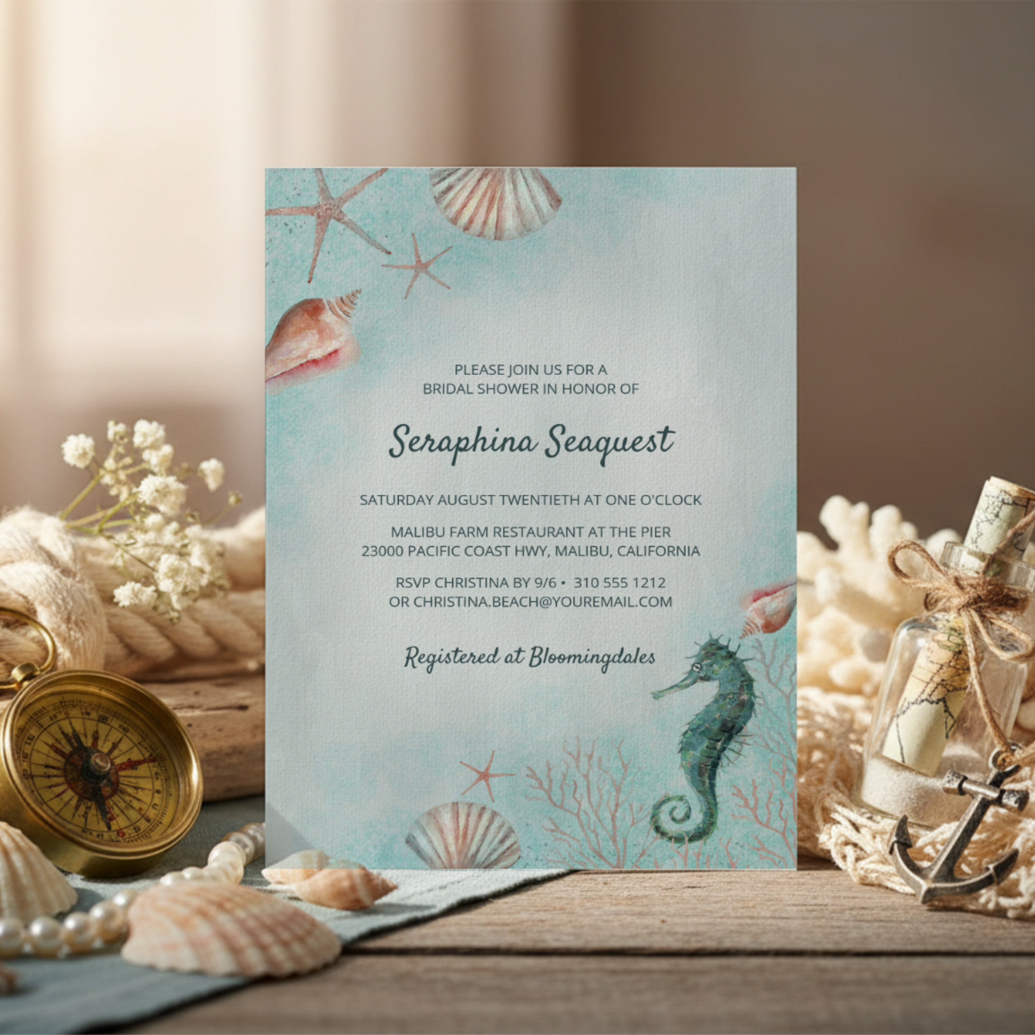 Beach bridal shower invitation with a watercolor seahorse, seashells, and coral on a soft ocean blue brushstroke background. Ideal for coastal, tropical, nautical, or under-the-sea themes.