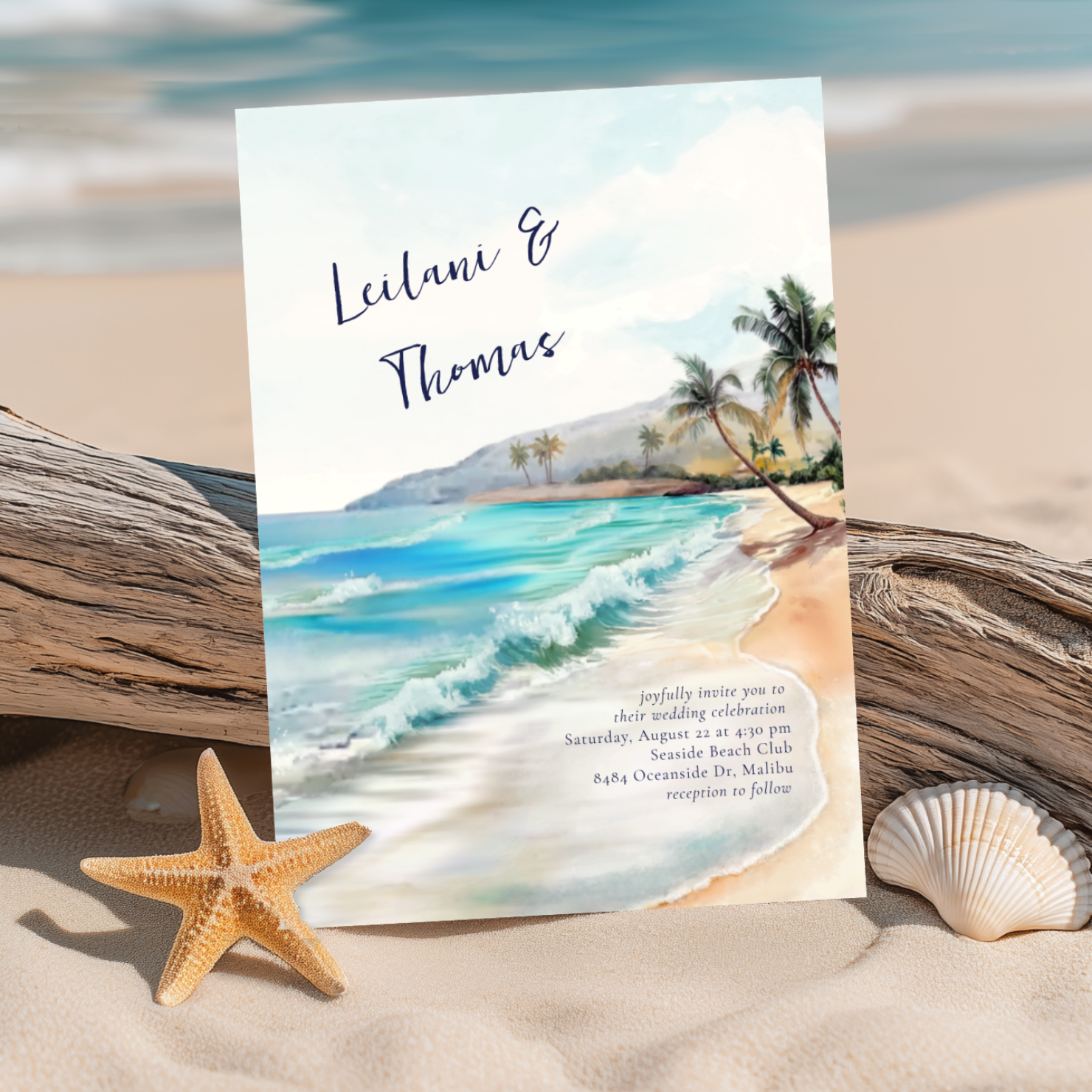 Step into a serene seaside paradise with this watercolor wedding invitation featuring a tropical beach, palm trees, sandy shore and turquoise ocean waves. The lettering is in a deep nautical navy, and there is a monogram on the reverse side of the in