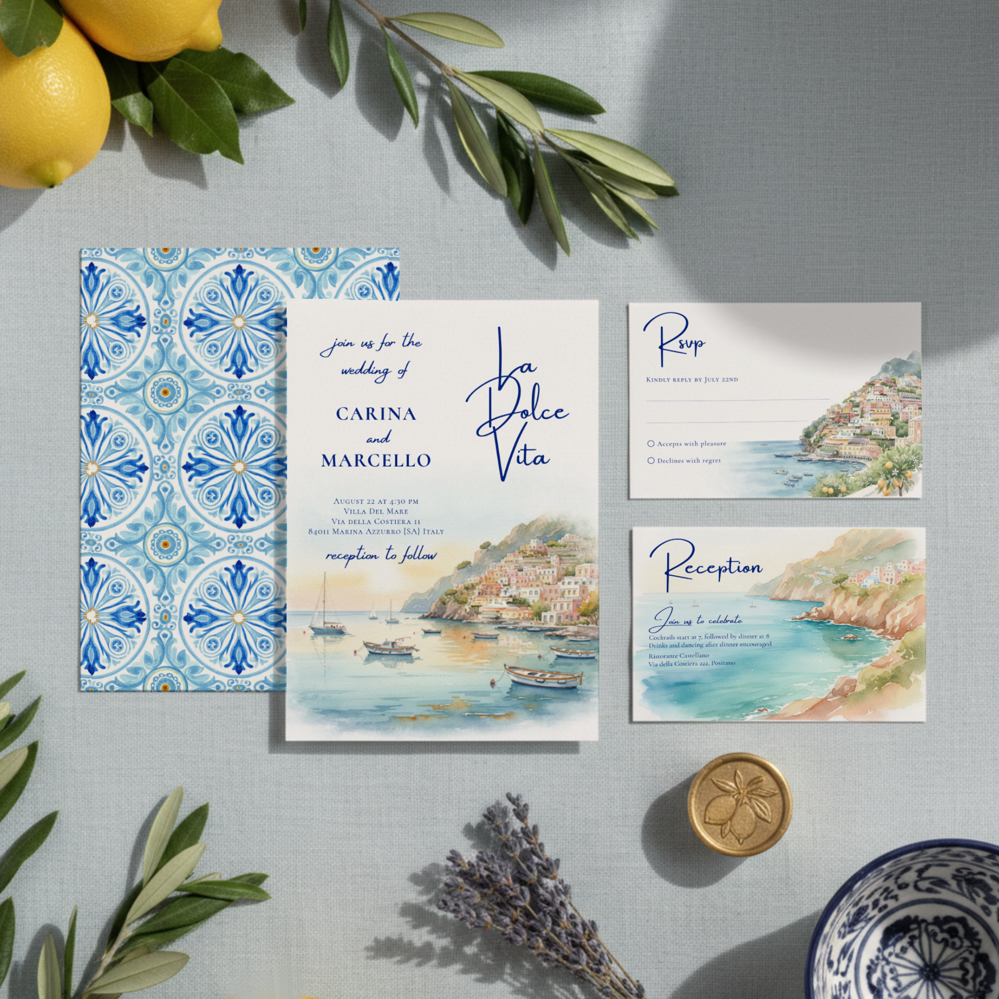 Amalfi Coast Amore wedding invitation suite featuring watercolor seaside village and harbor designs, elegantly arranged to show mix-and-match options.
