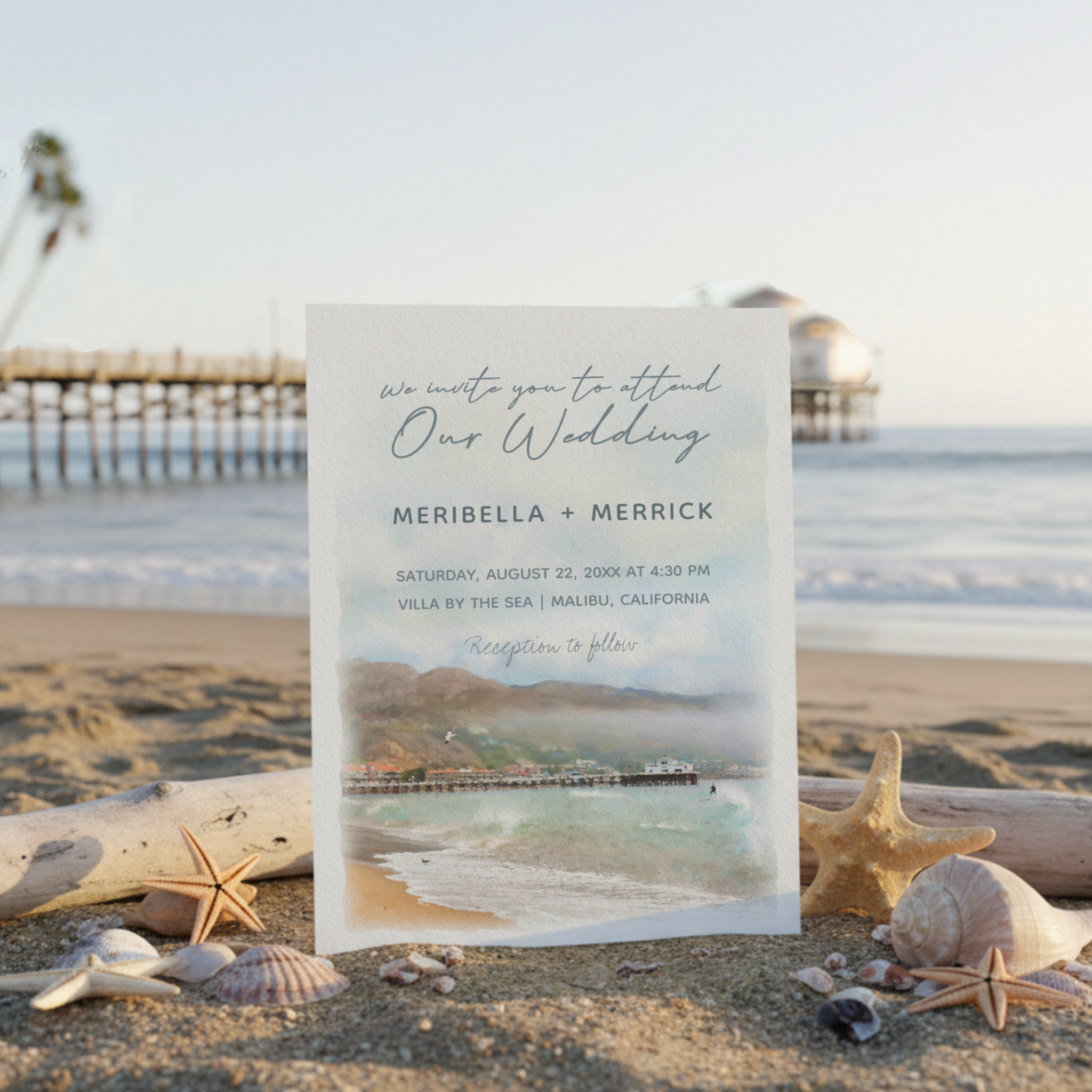 Capture the relaxed romance of Malibu with this watercolor wedding invitation featuring the iconic pier, Surfrider beach, soft sandy hues, and serene shoreline—perfect for coastal and destination celebrations.