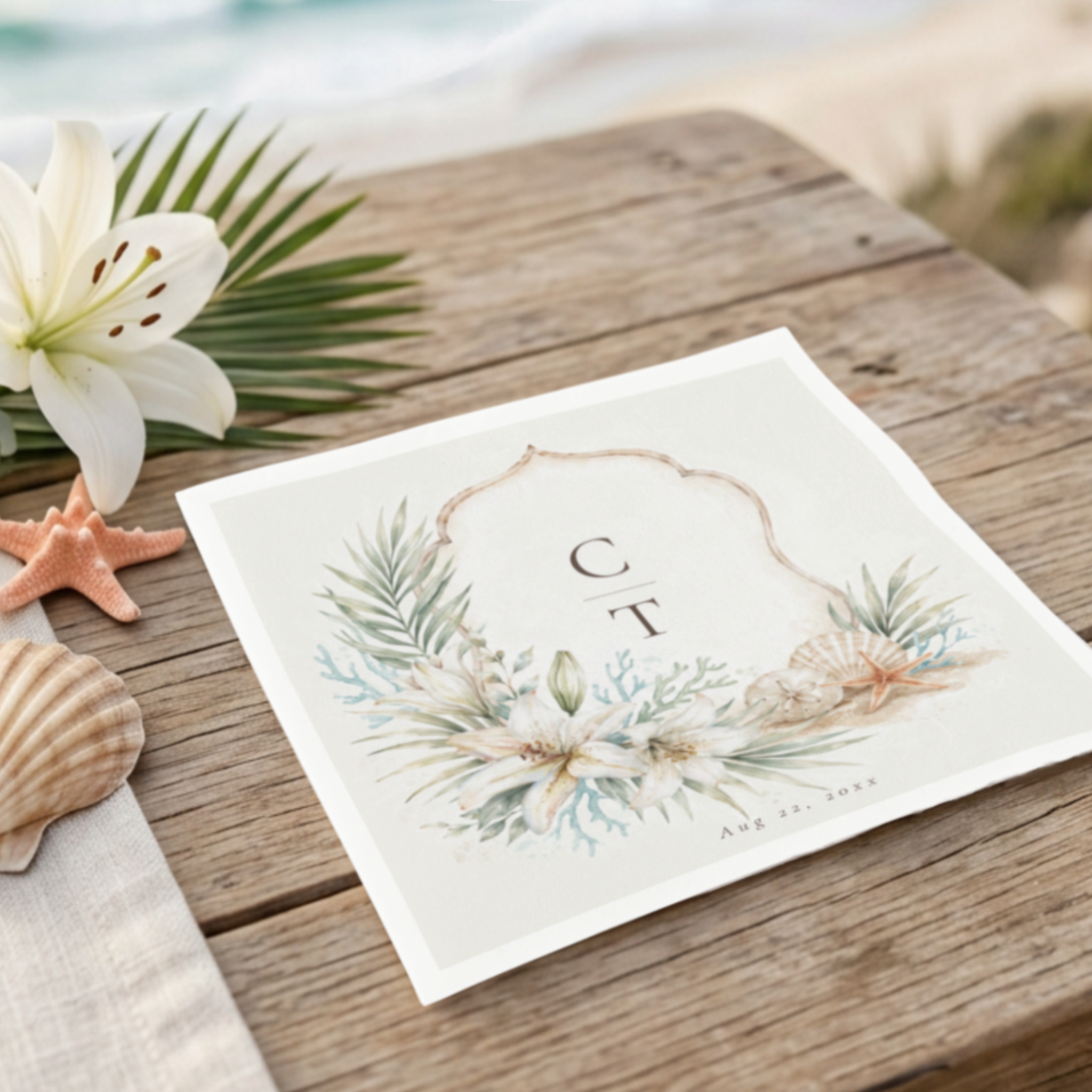 Tropical Boho Beach wedding napkins featuring a custom watercolor wedding crest with the couple's initials and wedding date. The crest is adorned with white Oriental lilies, seashells, coral accents, palm fronds, and eucalyptus leaves, creating an el