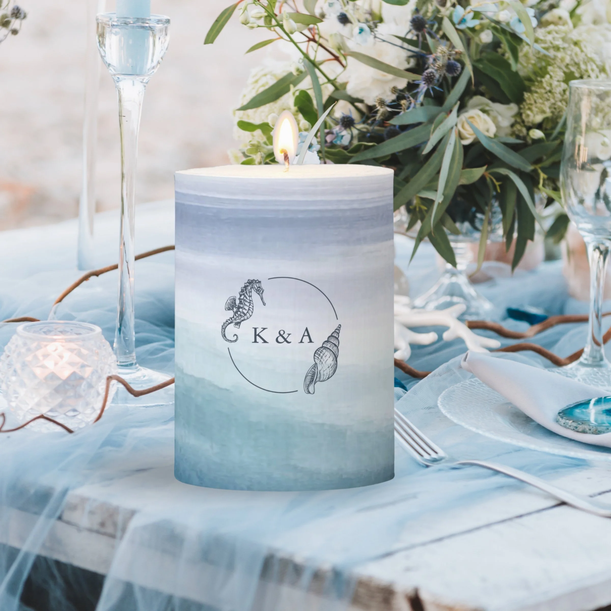 Add a coastal touch to your wedding or home décor with this pillar candle featuring abstract watercolor ocean waves and a personalized seahorse and sea shell couple’s monogram. Perfect for a beach or nautical themed wedding or memorable keepsake or g