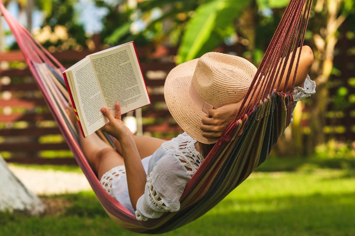 A woman in a straw hat relaxing in a hammock with a book, a calm way to wind down before bed.Boundary script graphic: Acknowledge, set the Boundary, then offer a Creative Yes when a parent criticizes your choices.