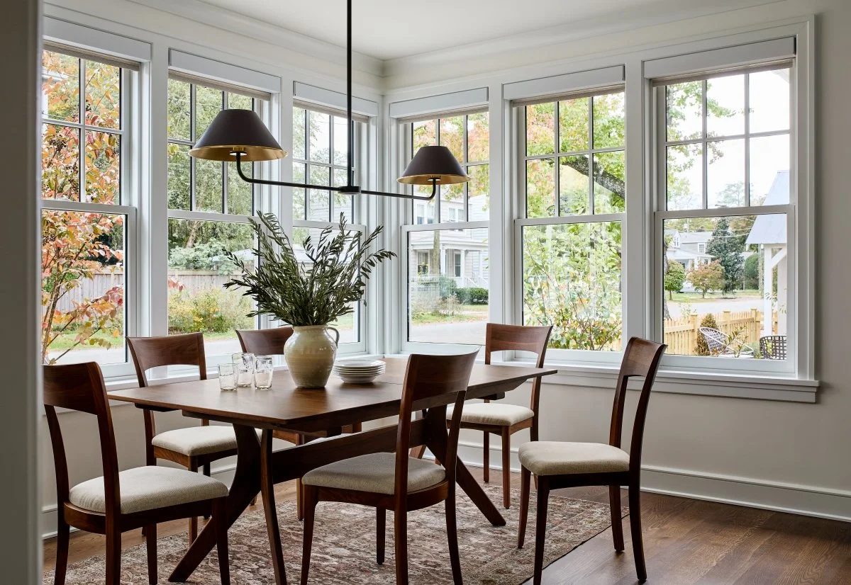 Dining nook surrounded by windows