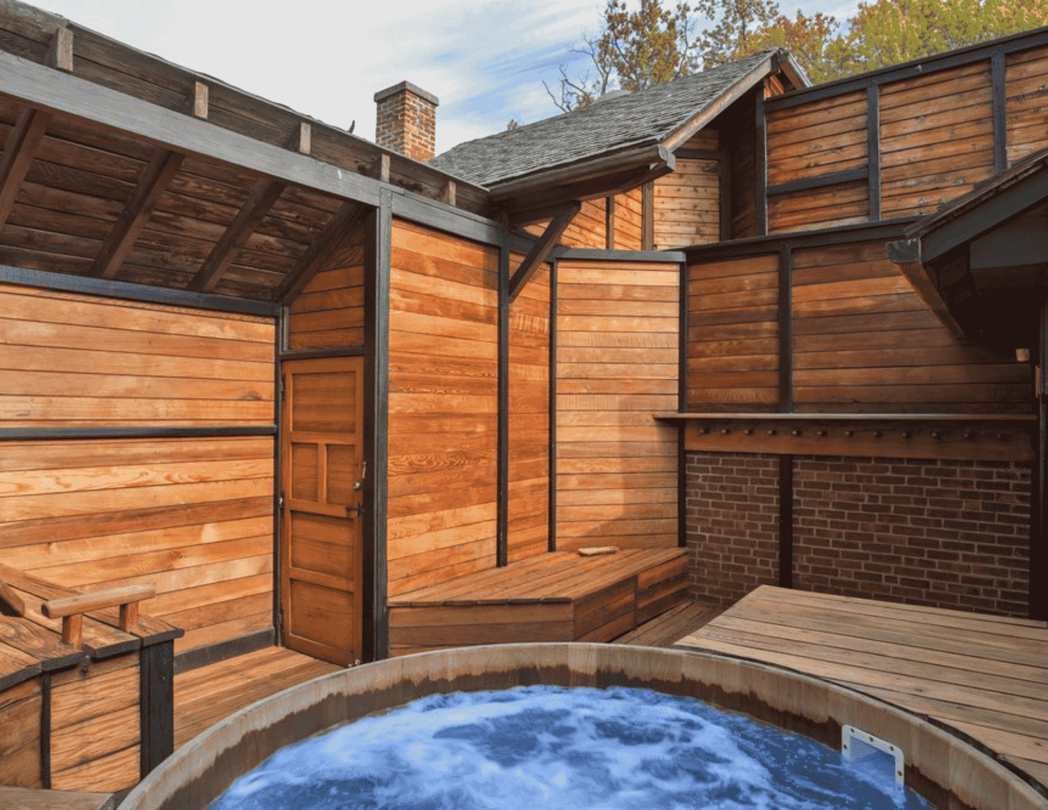 A small outdoor hot tub at East Heaven.