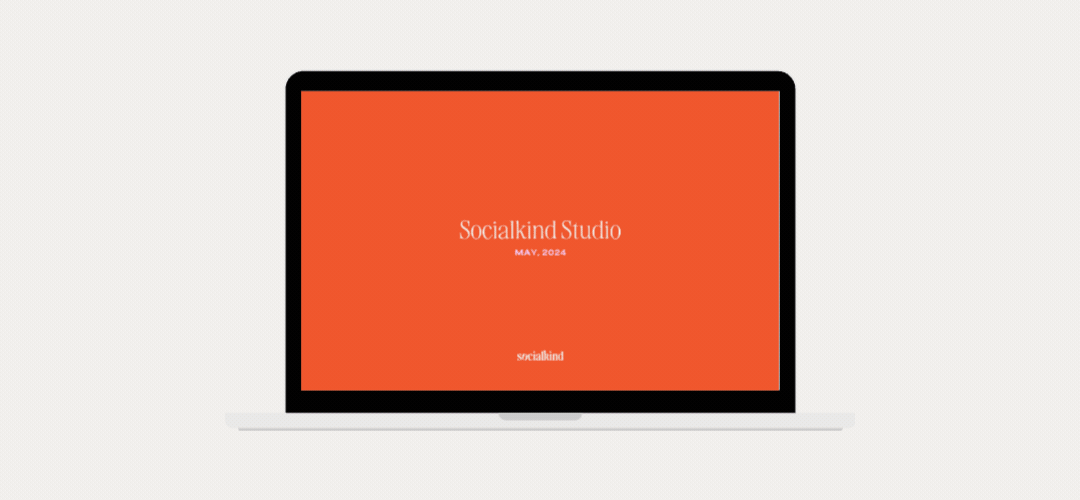 laptop showing socialkind studio monthly digital marketing analytics presentation