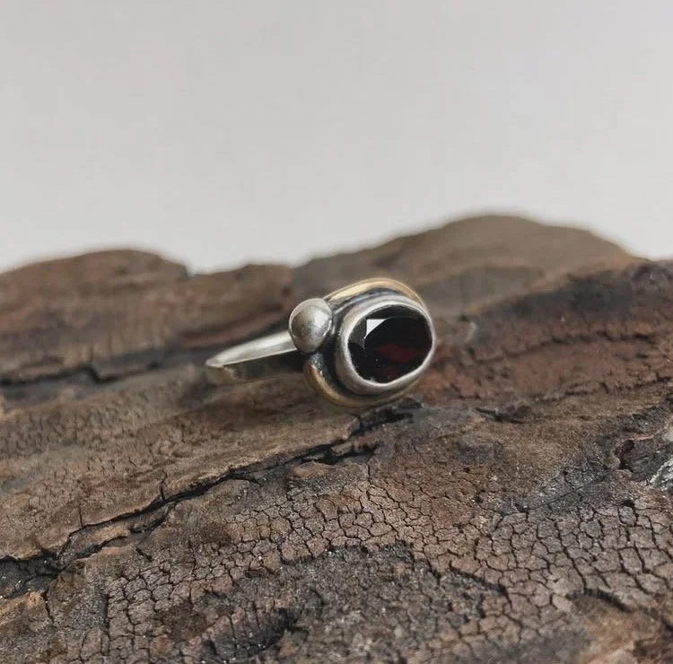 In Orbit Garnet Ring (size 5.75)