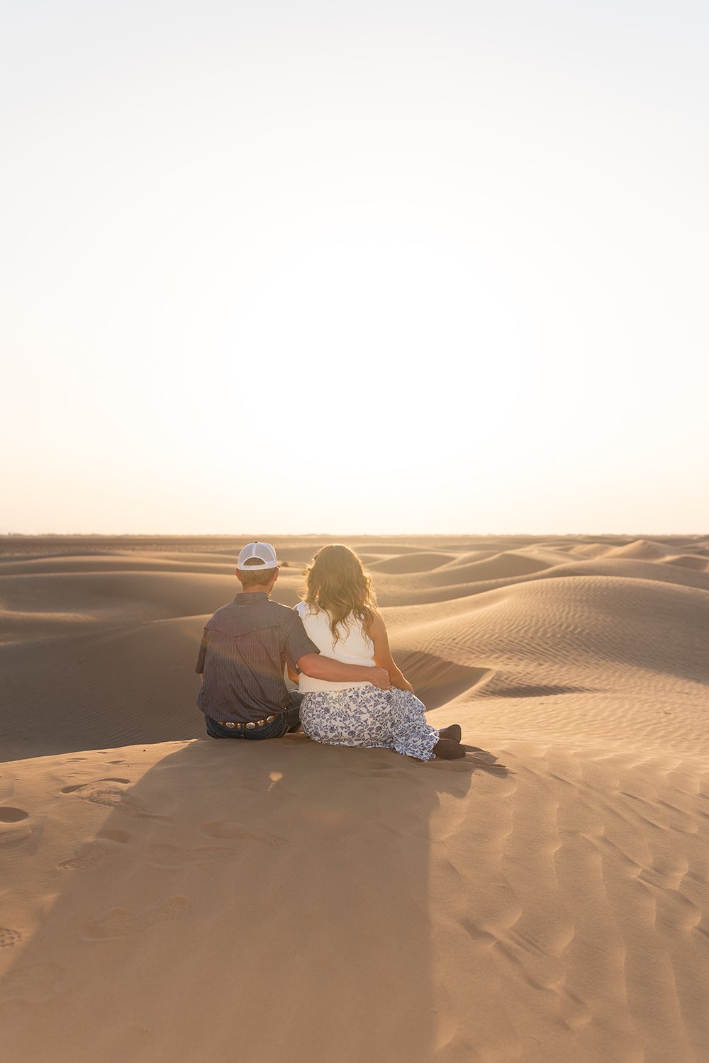 Couple-enjoying-desert-sunset.jpg