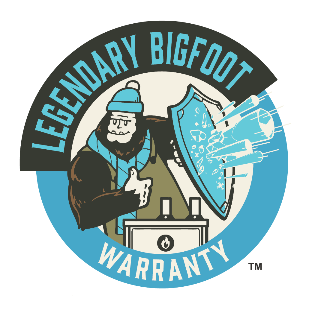 A cartoon Bigfoot character wearing a winter hat and scarf, giving a thumbs up, while holding a shield and standing behind a stove, with the words "Legendary Bigfoot Warranty" encircling the image.