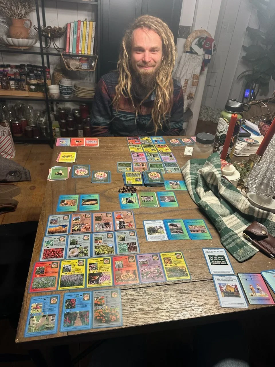 Ecotopian EarthCare Card Game playing with Sam.jpg