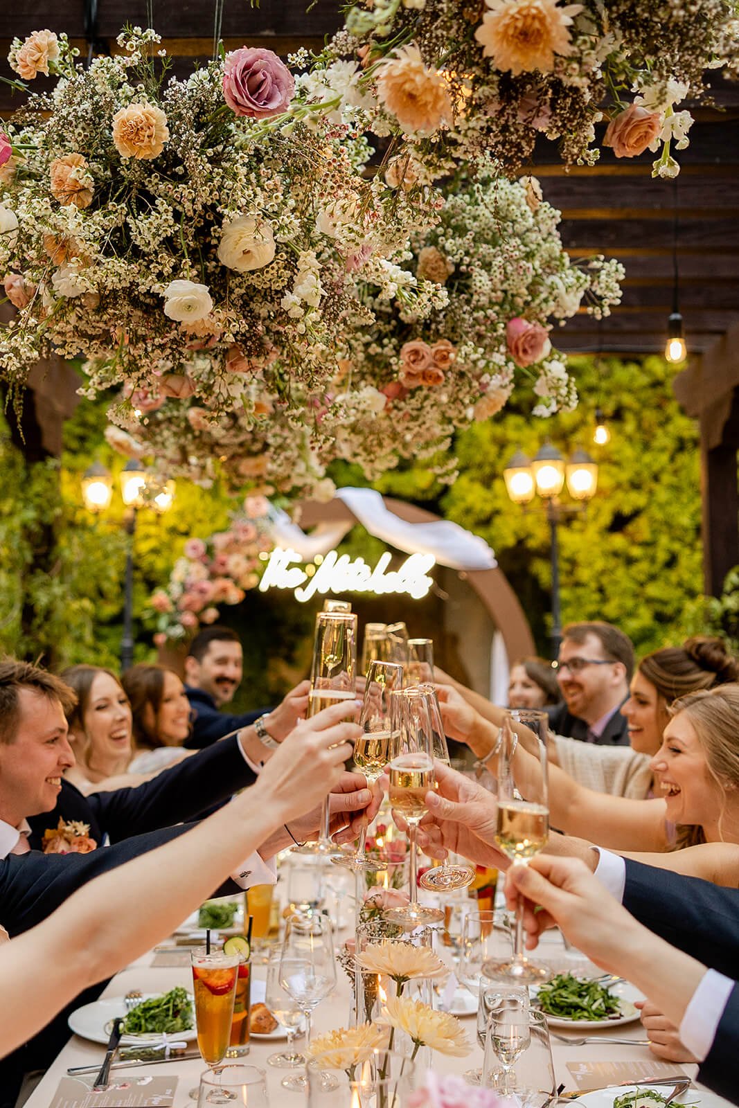 franciscan-gardens-wedding-reception-hanging-flower-clouds-on-pergola.jpeg