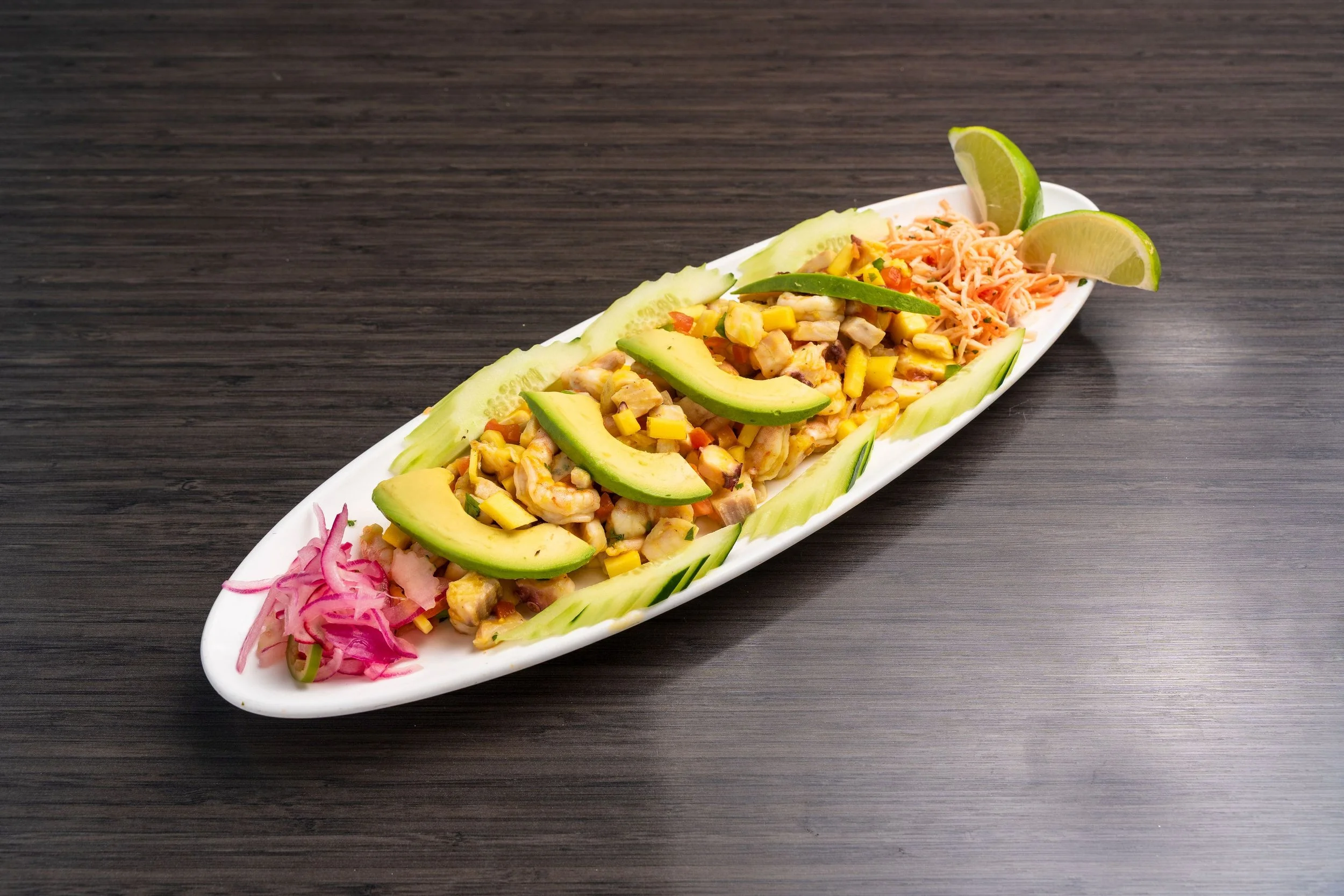 Seafood ceviche with avocado, cucumber and lime at El Muelle Seafood in Houston