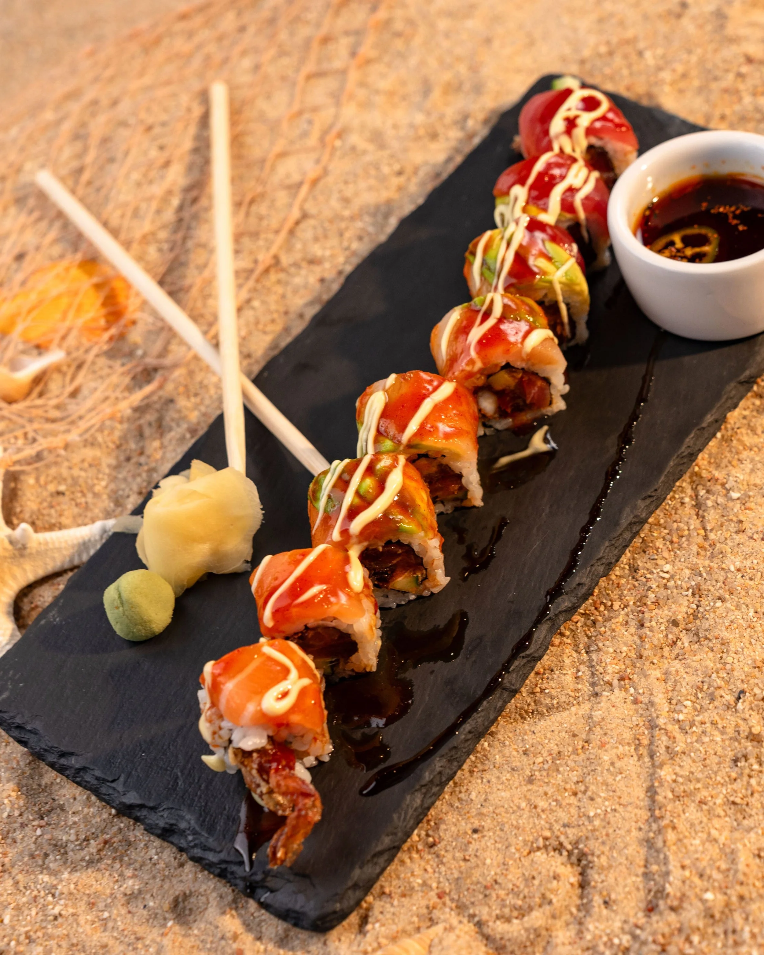 Lickety Roll topped with tuna and salmon at El Muelle Seafood in Houston