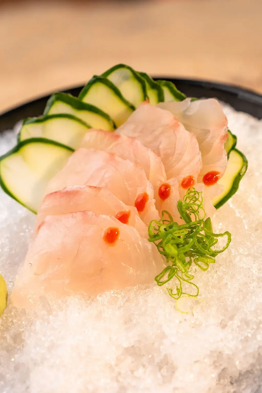 Premium tuna sashimi prepared in-house at El Muelle Seafood from whole tuna, sliced fresh and served over ice.