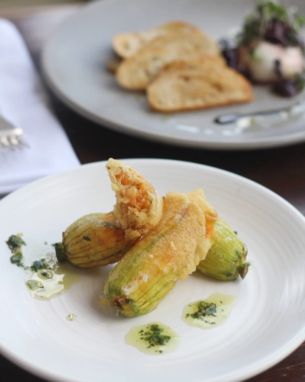 It&rsquo;s &ldquo;Fiori di Zucca&rdquo; season! Ricotta stuffed squash blossoms are a delicacy we can get behind.