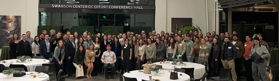 Current and past students at retirement party 2024