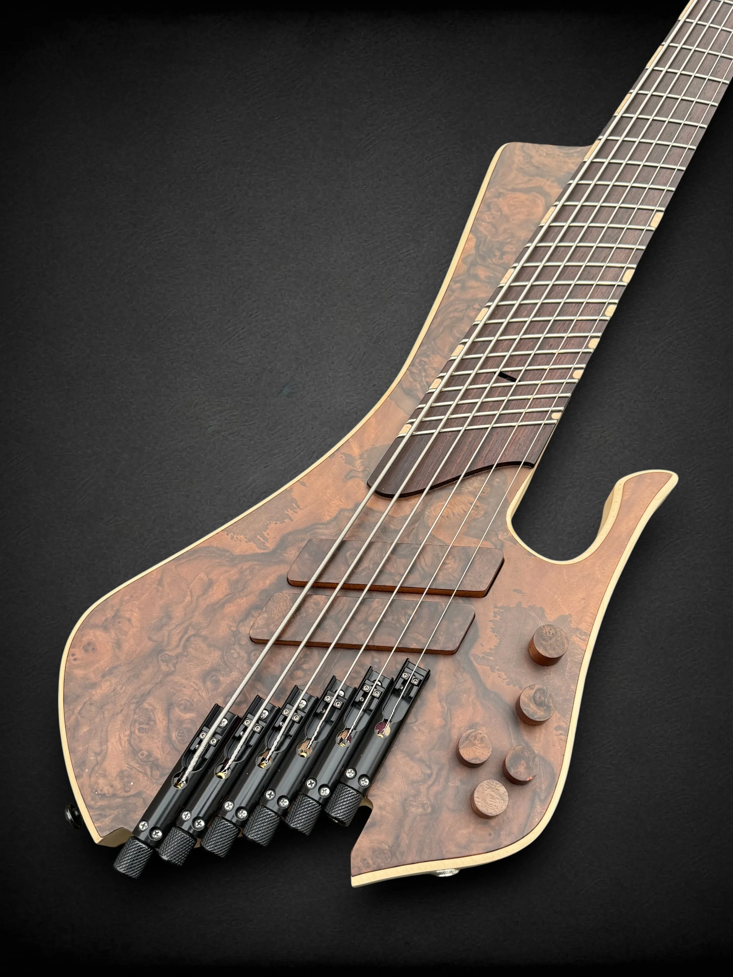 Fingy Bass Multiscale 6 Burled Walnut FRONT TR-Photoroom.jpg