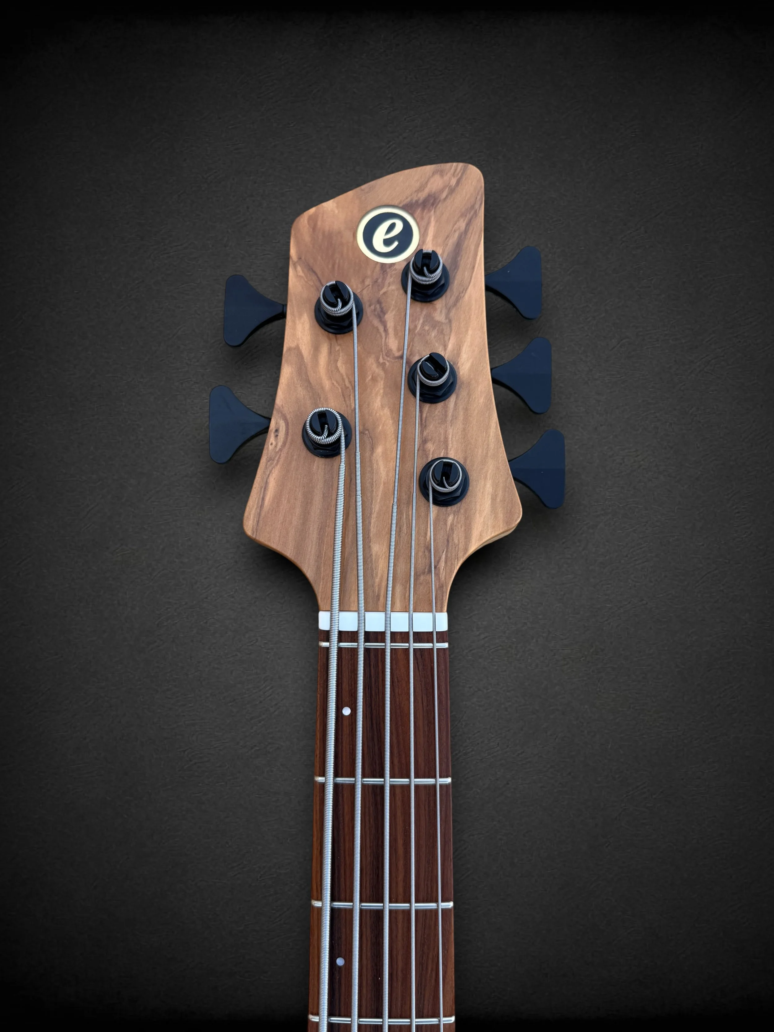 Elrick EVO Gold 5 Olivewood FRONT HEADSTOCK-Photoroom.jpg