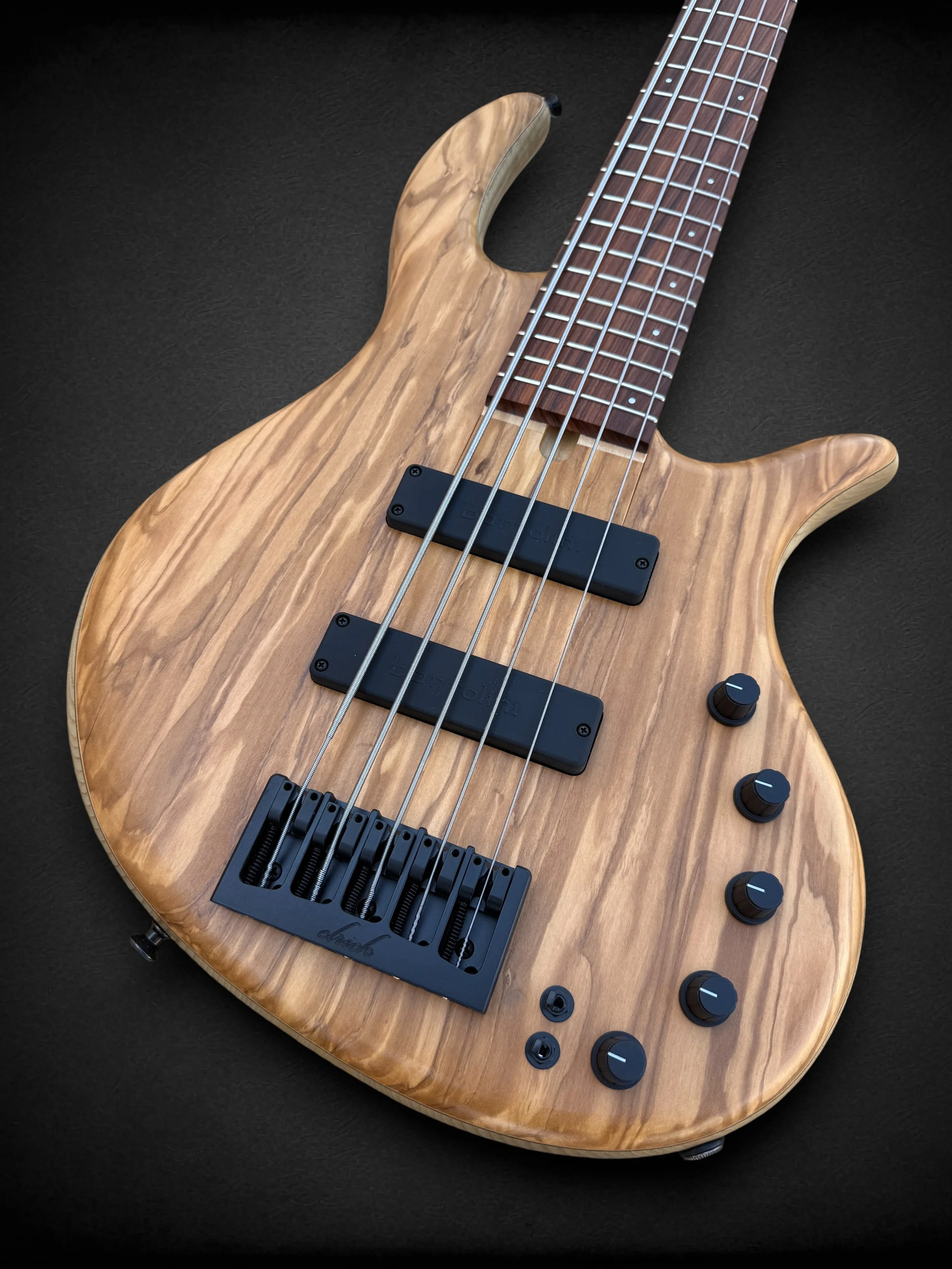 Elrick EVO Gold 5 Olivewood FRONT TR-Photoroom.jpg