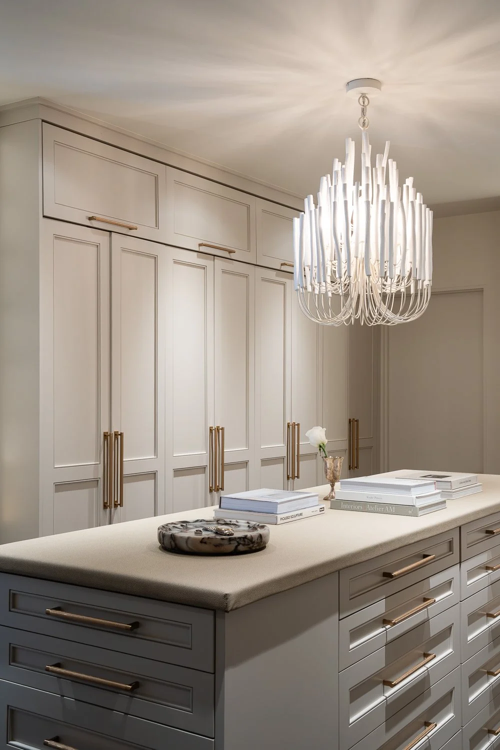 Studio Thomas timeless bespoke interior architecture no 026 master closet cream custom cabinetry storage leather topped island