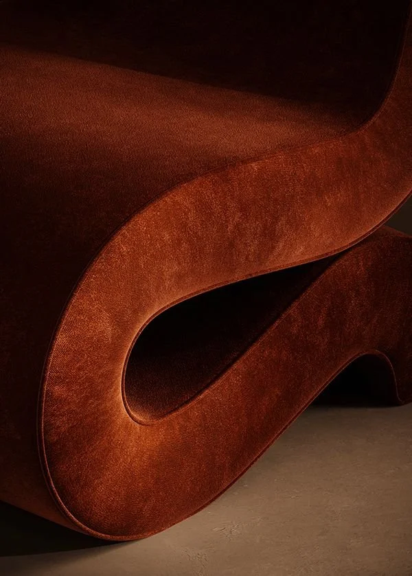 Embark design you can feel how we use the 5 senses to create meaningful spaces red velvet curved chair