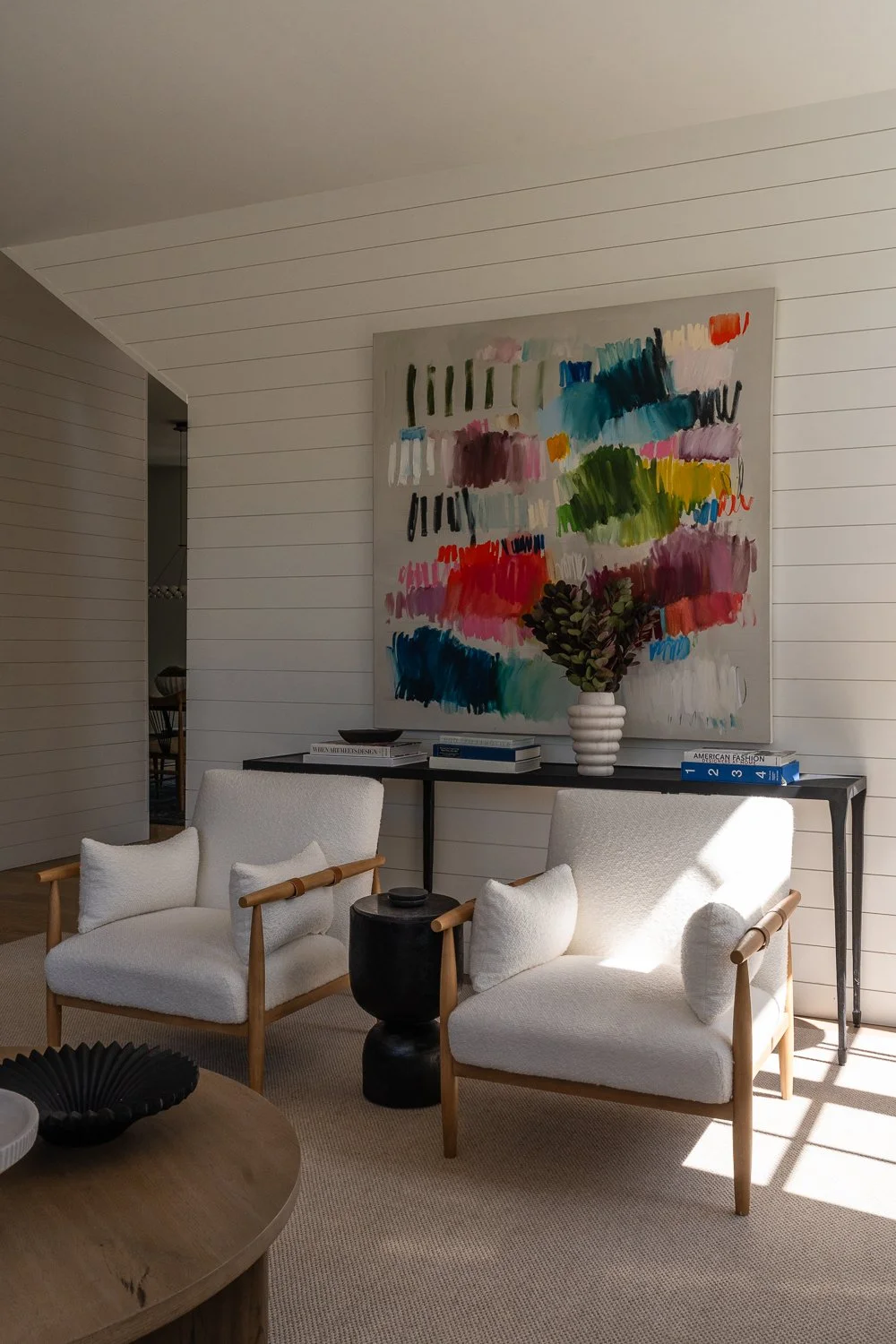 Studio Thomas Denver bespoke interior design no 035 white great room accent chairs custom colorful artwork