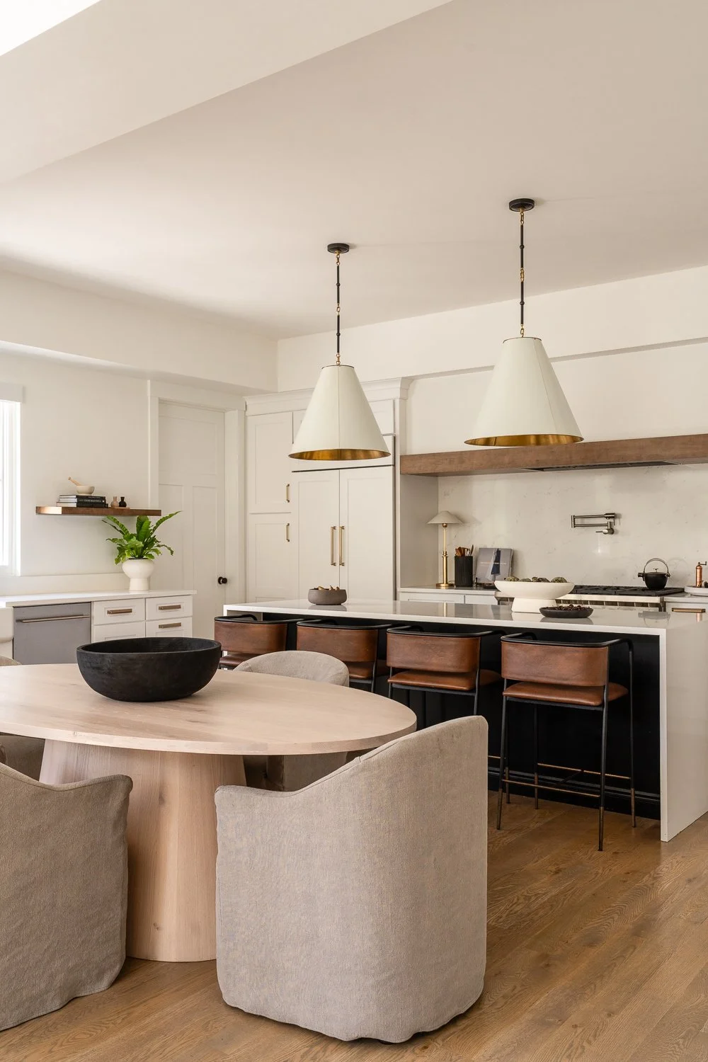 Studio Thomas Denver bespoke interior design no 035 kitchen light wood finished table chairs leather barstools