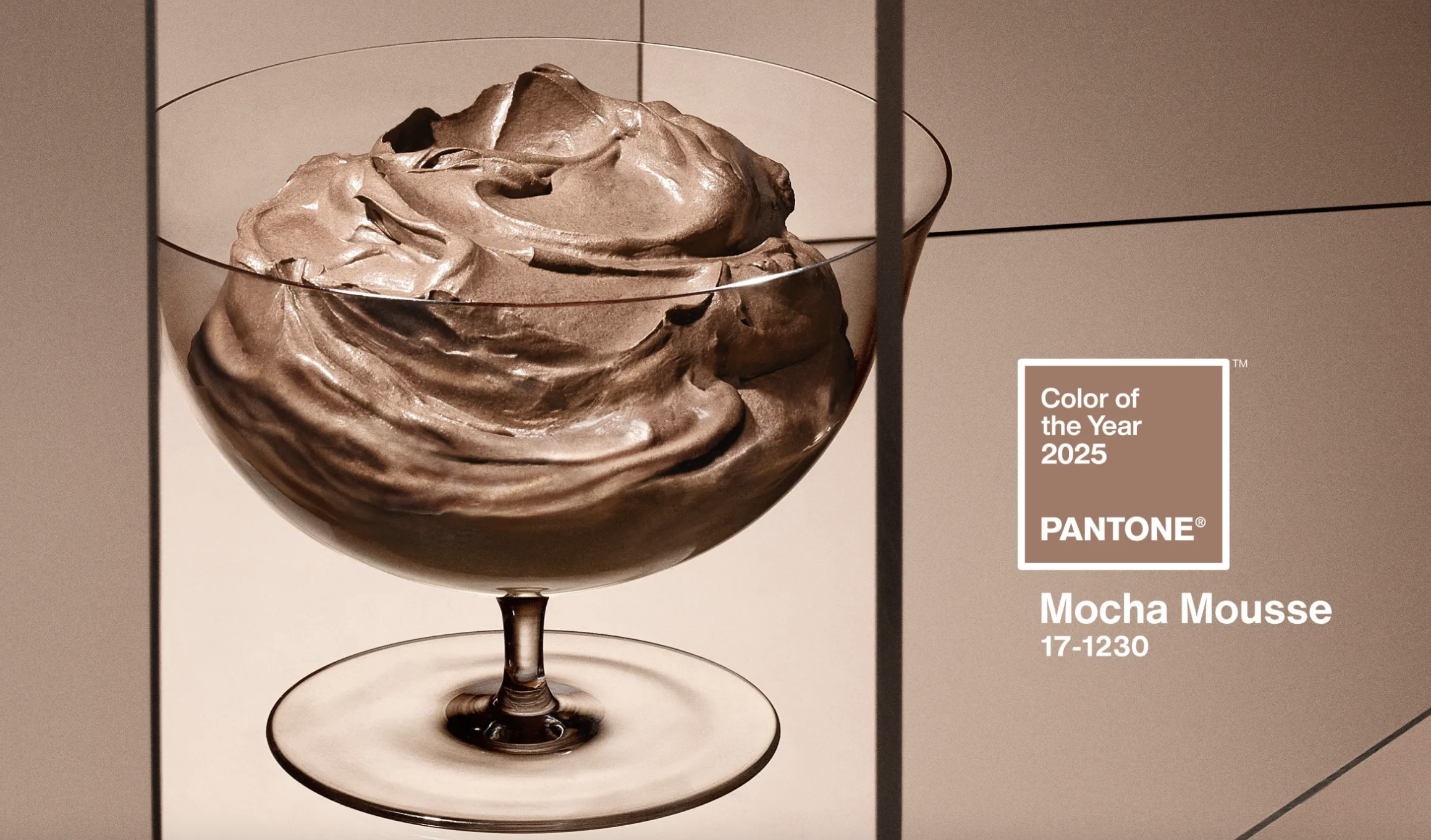 A picture of a glass with brown moose showing the colour of the year