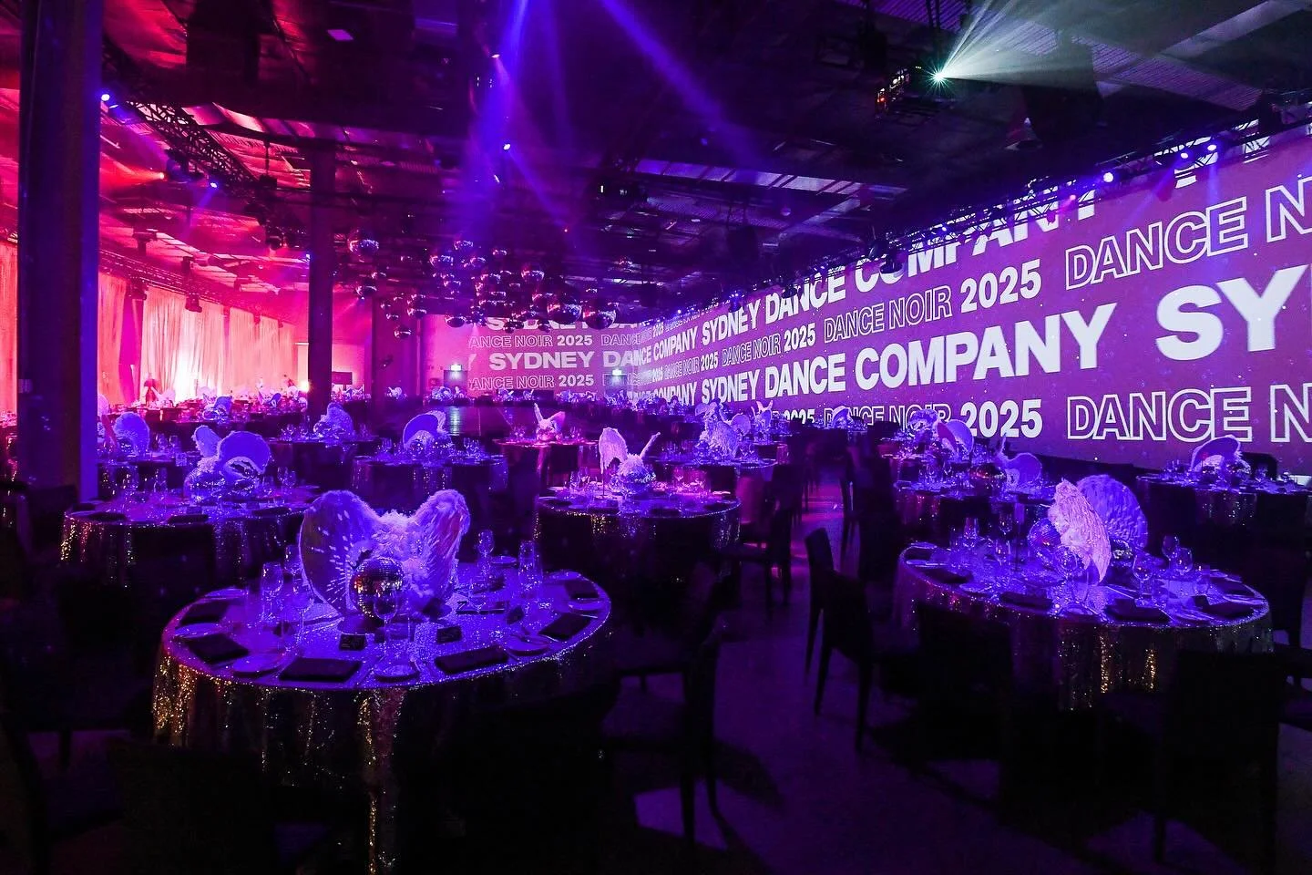 Dance Noir 2025 - @sydneydanceco 

#performance #dance #party #fundraiser 
#gala #projection #show #warehouse #lights 
#mirrorball #blitz